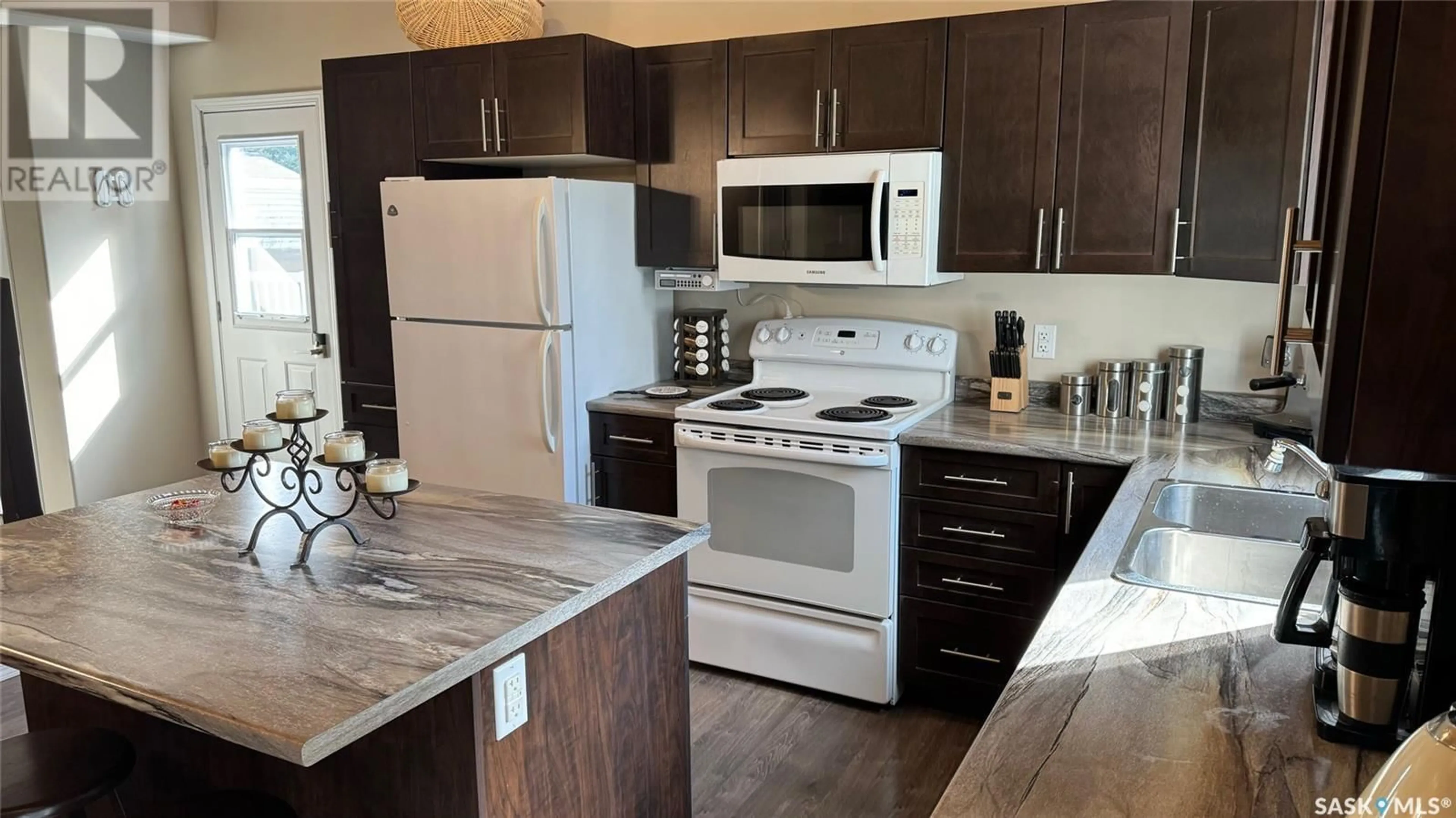 Open concept kitchen, wood/laminate floor for LOT 4 Sturgeon Lake West, Sturgeon Lake Saskatchewan S0J2E0