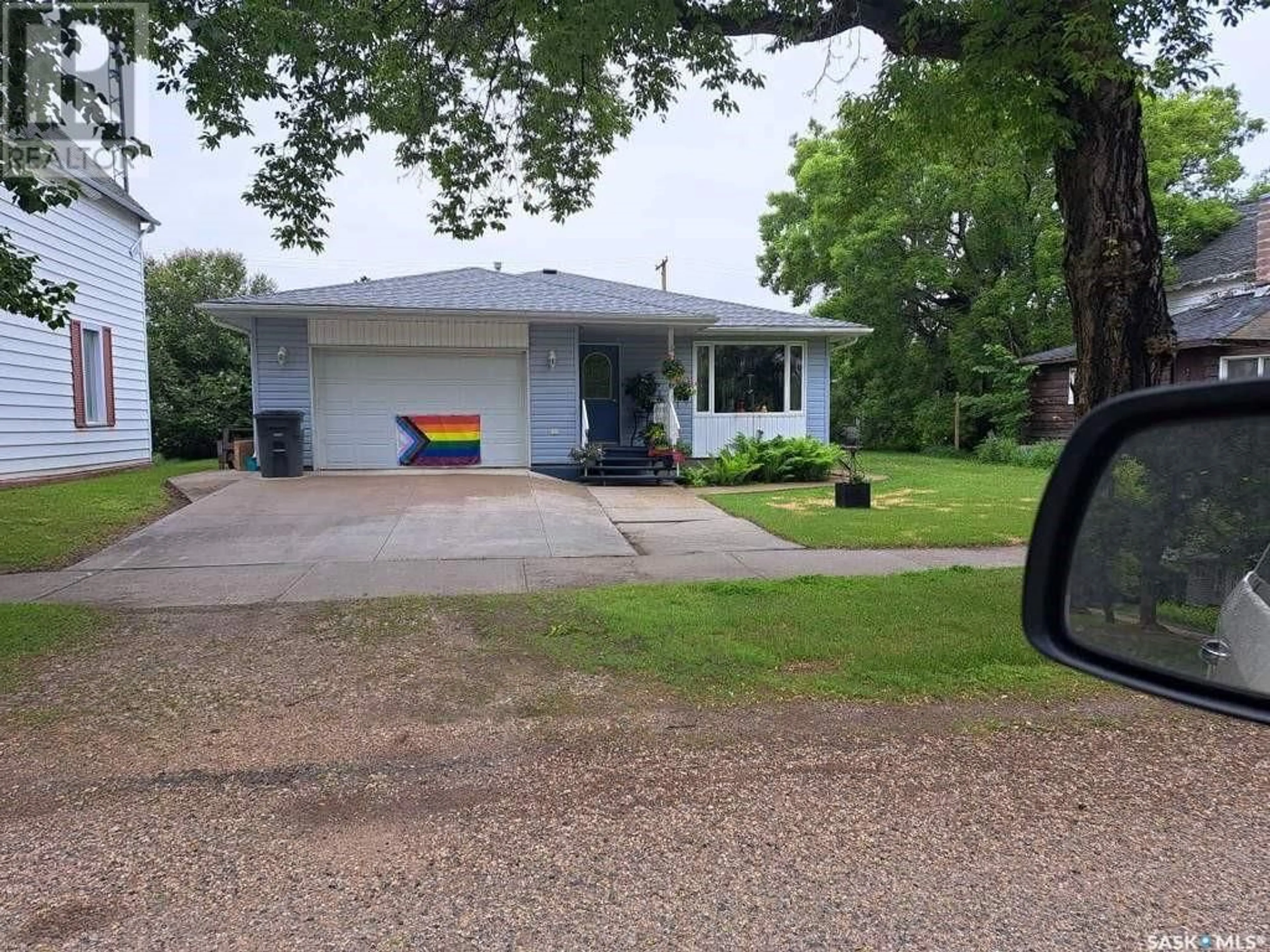 A pic from outside/outdoor area/front of a property/back of a property/a pic from drone, street for 206 3rd AVENUE E, Nokomis Saskatchewan S0G3R0