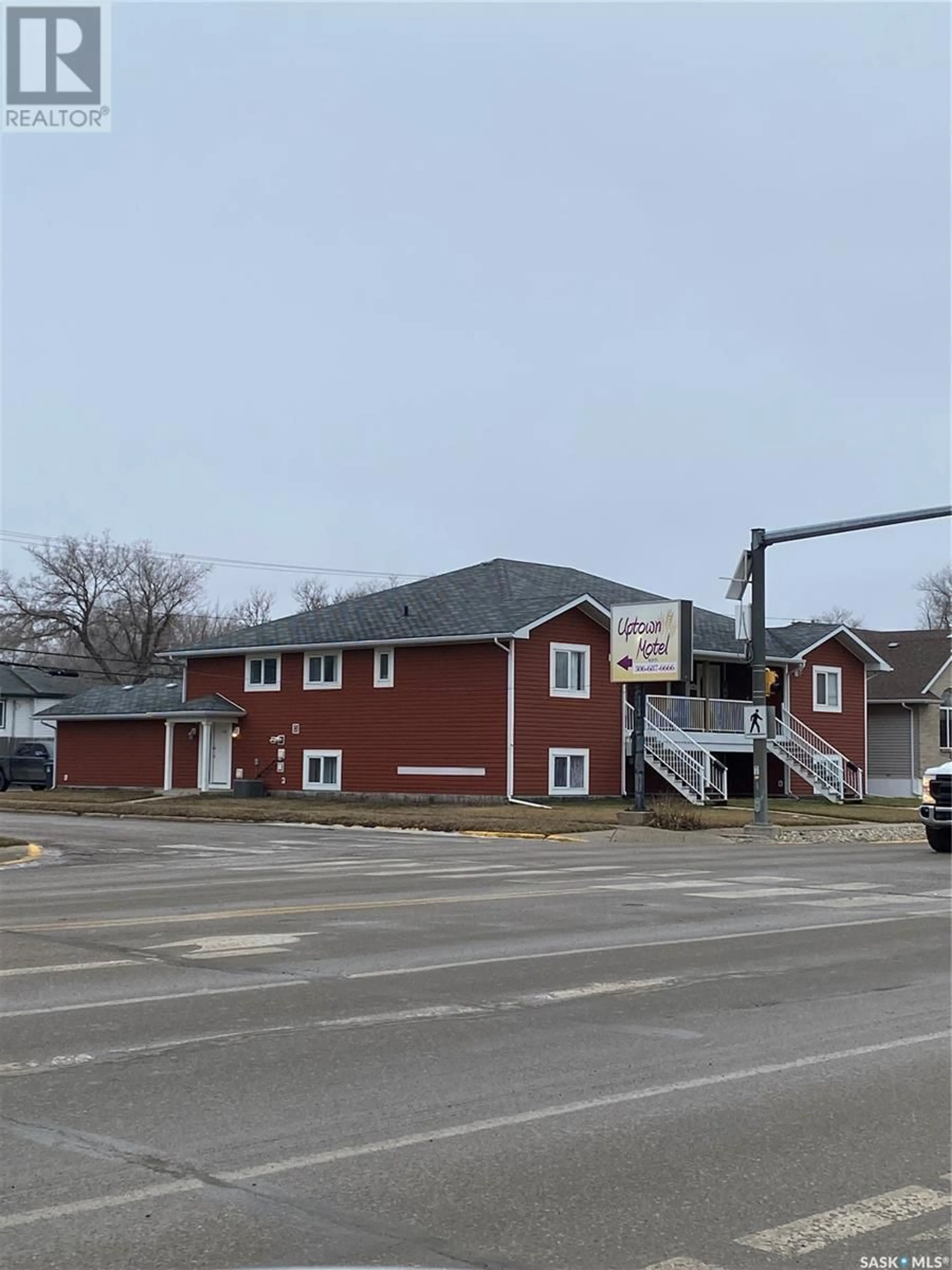 A pic from outside/outdoor area/front of a property/back of a property/a pic from drone, building for 1 1402 4th STREET, Estevan Saskatchewan S4A0X4