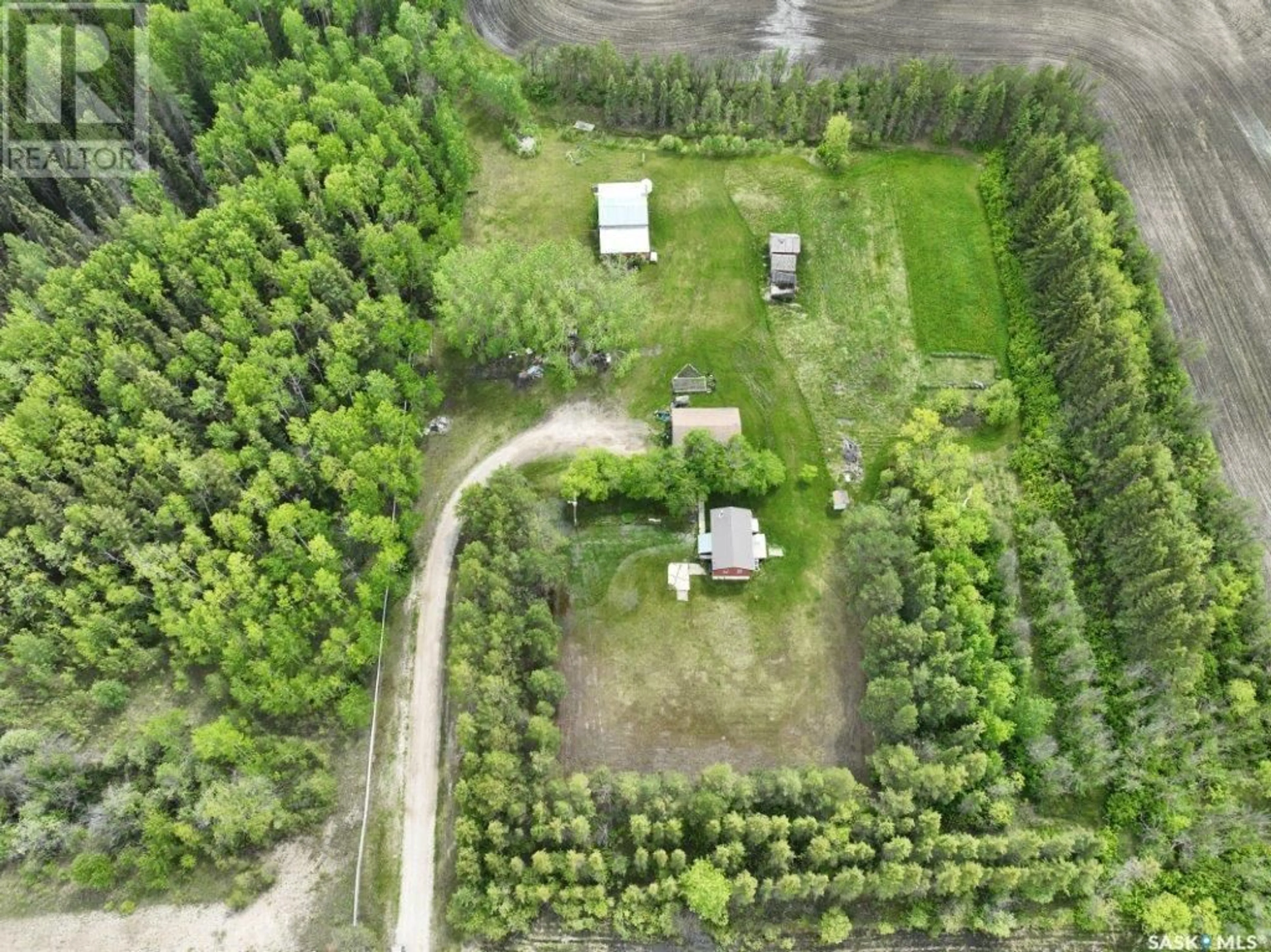 A pic from outside/outdoor area/front of a property/back of a property/a pic from drone, forest/trees view for 4.55 Acres North, Hudson Bay Rm No. 394 Saskatchewan S0E0Y0