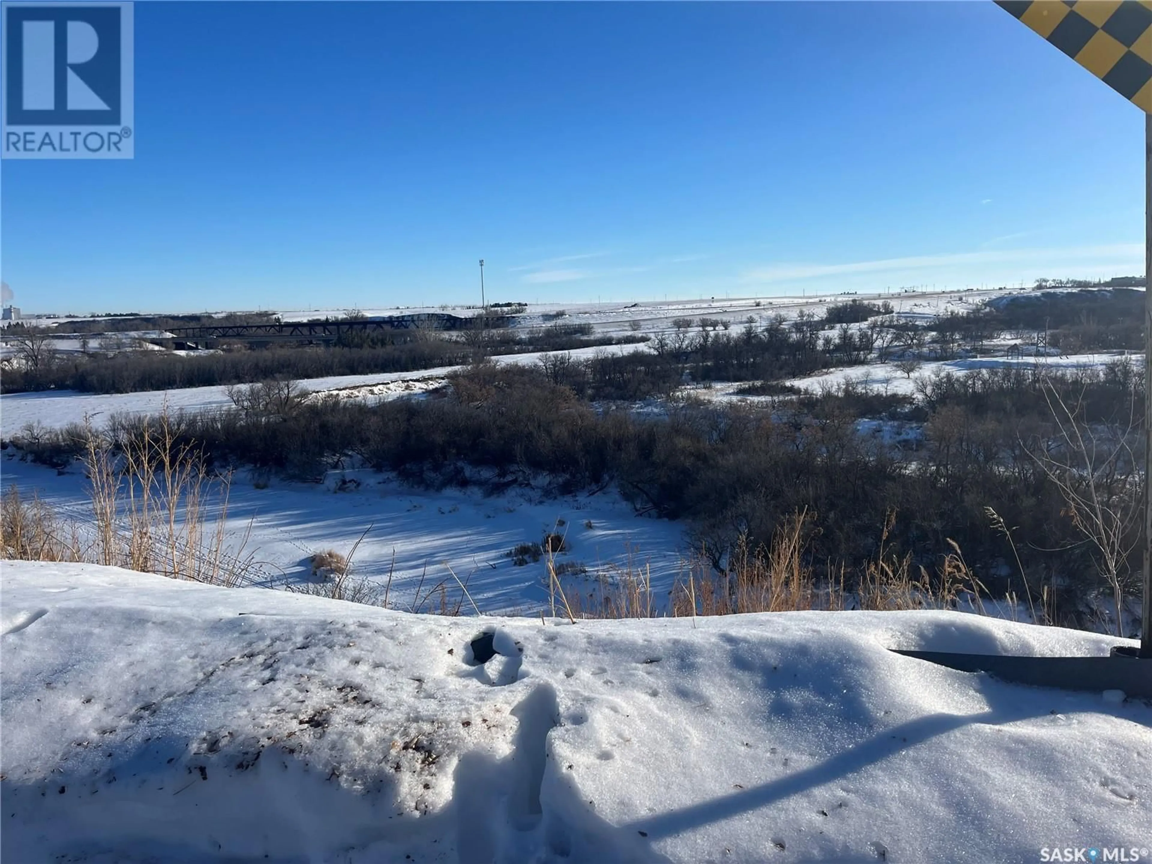 A pic from outside/outdoor area/front of a property/back of a property/a pic from drone, mountain view for 836 Outlook AVENUE SW, Moose Jaw Saskatchewan S6H5T9