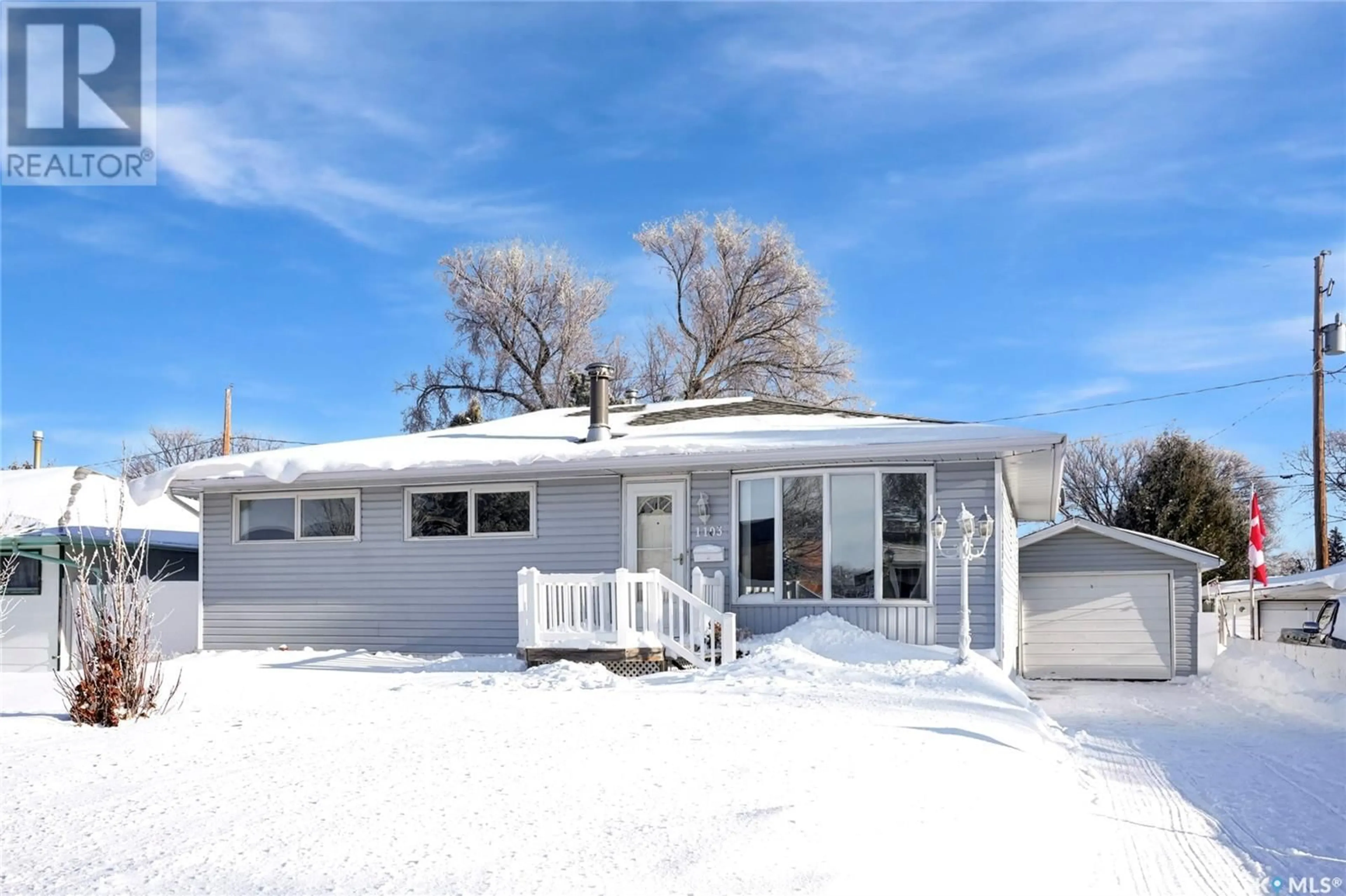 Home with vinyl exterior material, street for 1103 Simpson AVENUE, Moose Jaw Saskatchewan S6H4M7