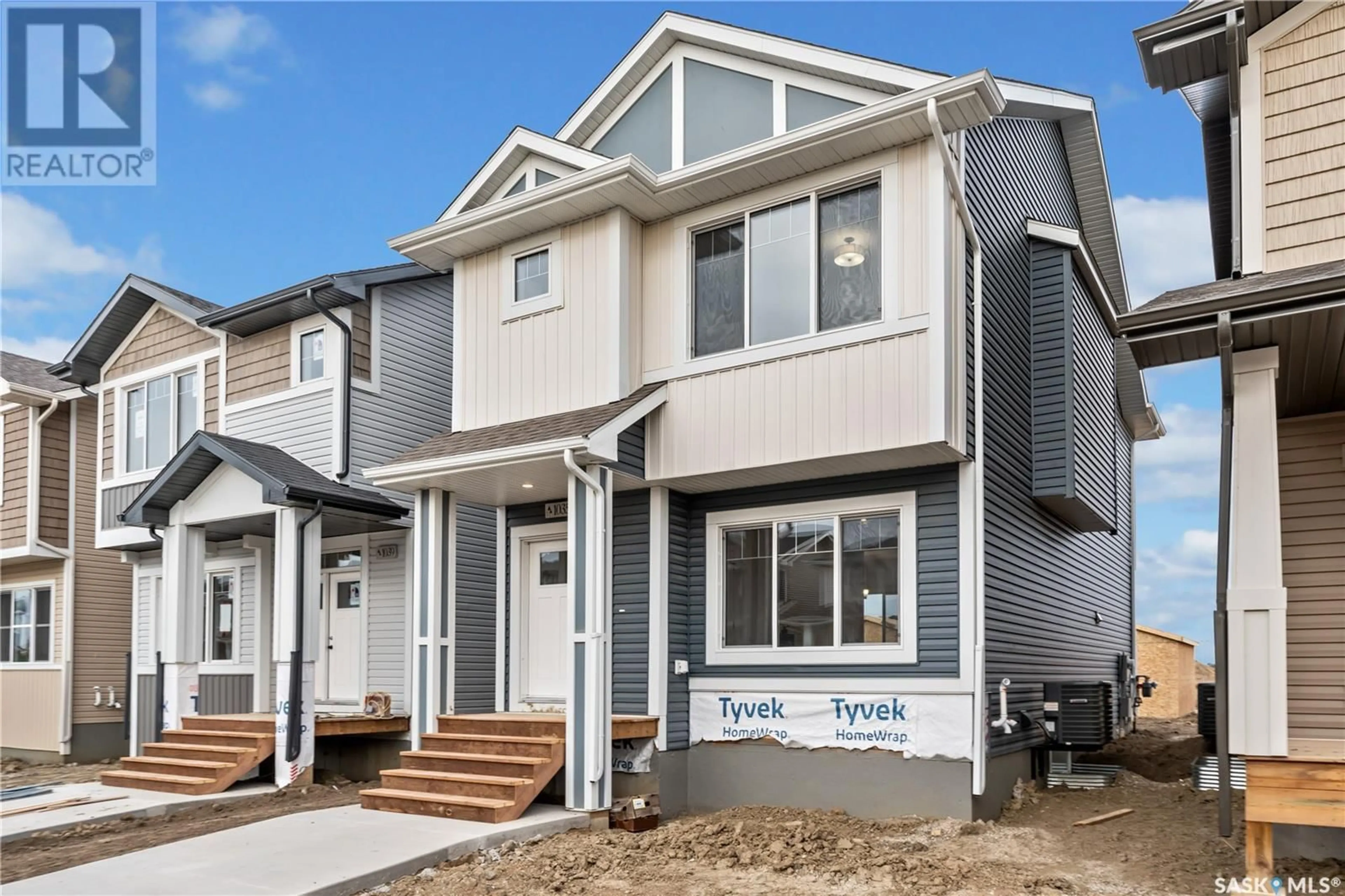 Home with vinyl exterior material, street for 175 Kostiuk CRESCENT, Saskatoon Saskatchewan S7W0L8