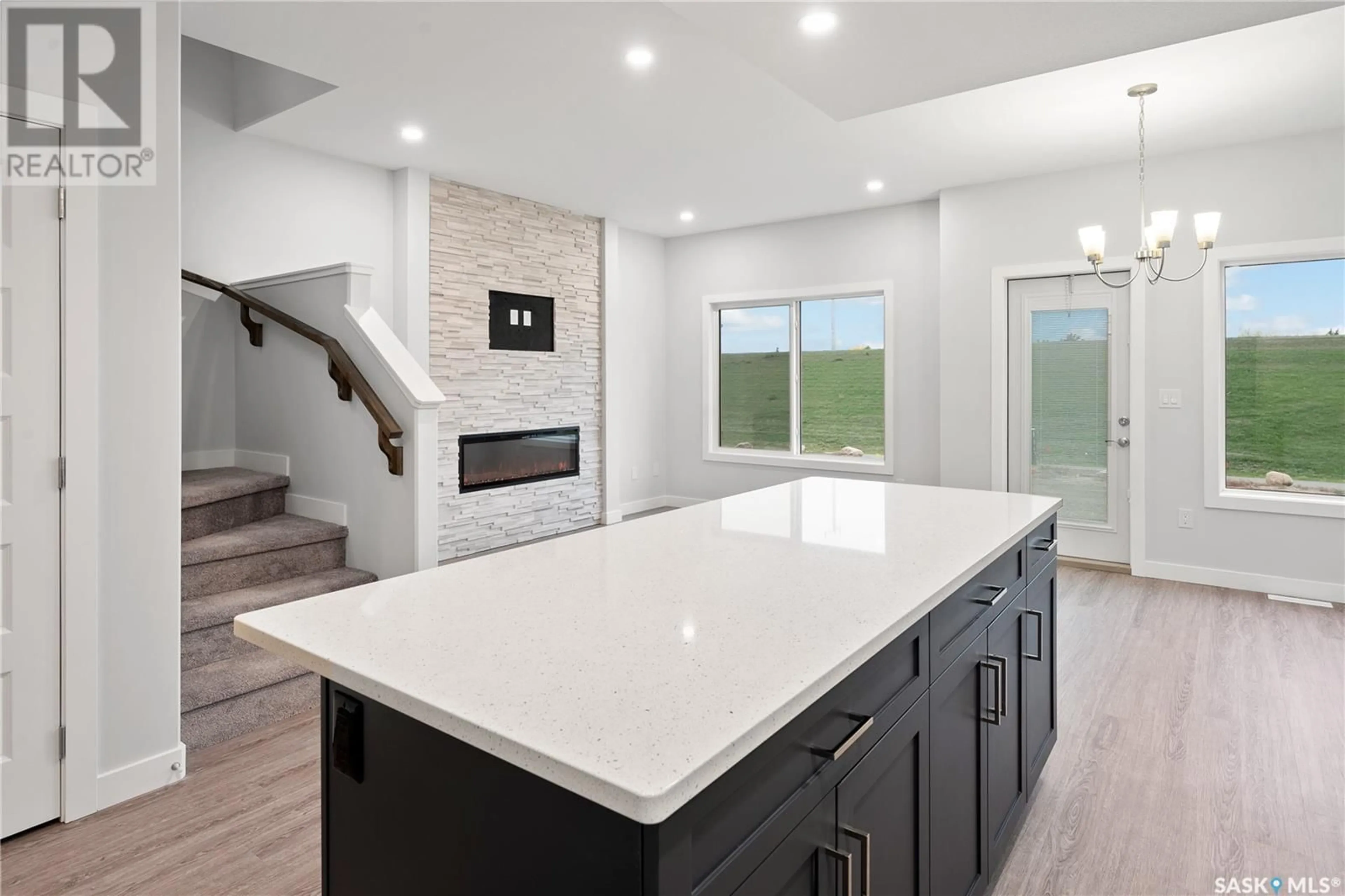 Open concept kitchen, ceramic/tile floor for 106 Kostiuk CRESCENT, Saskatoon Saskatchewan S7W0L8