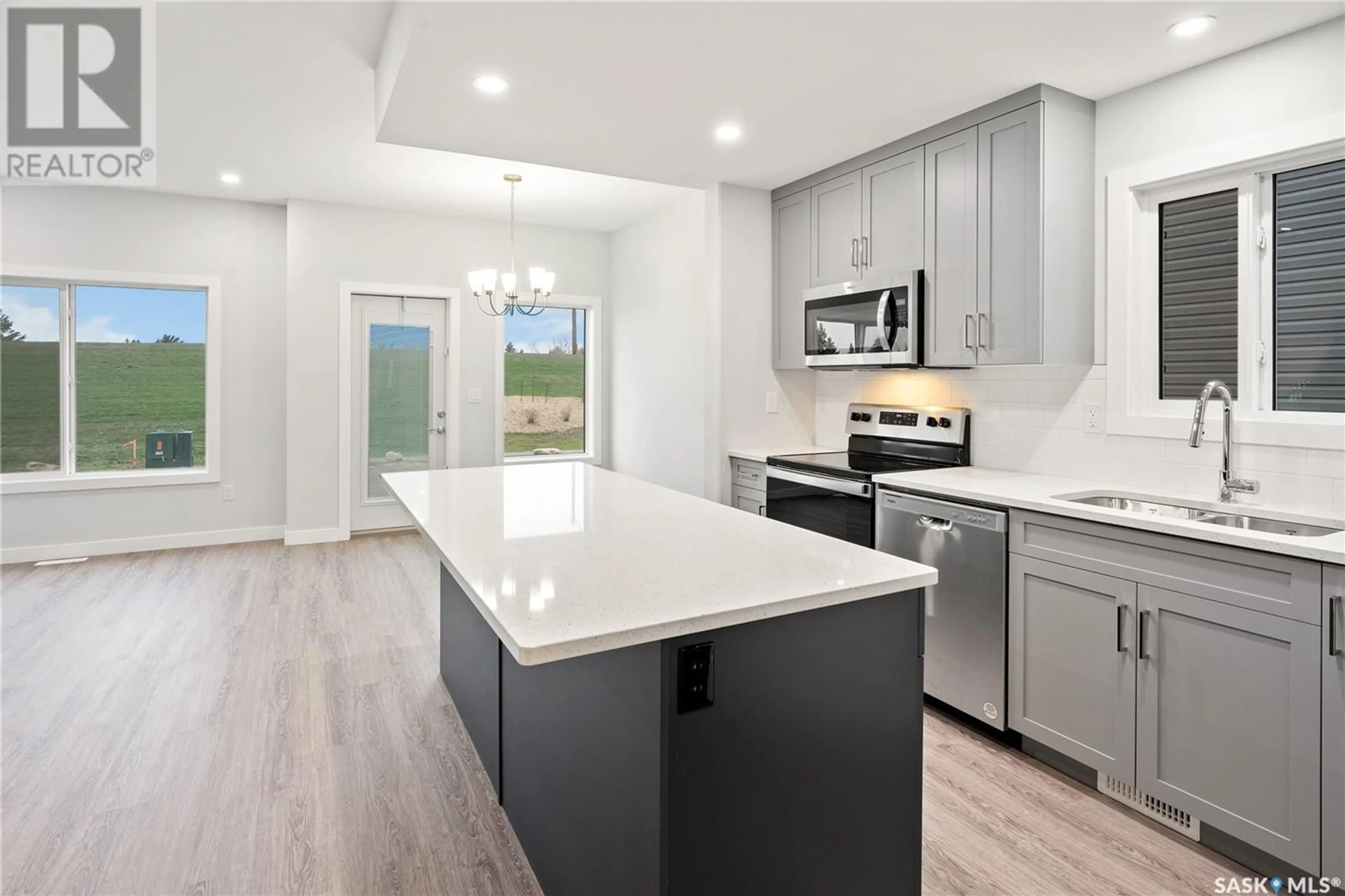 Open concept kitchen, ceramic/tile floor for 106 Kostiuk CRESCENT, Saskatoon Saskatchewan S7W0L8