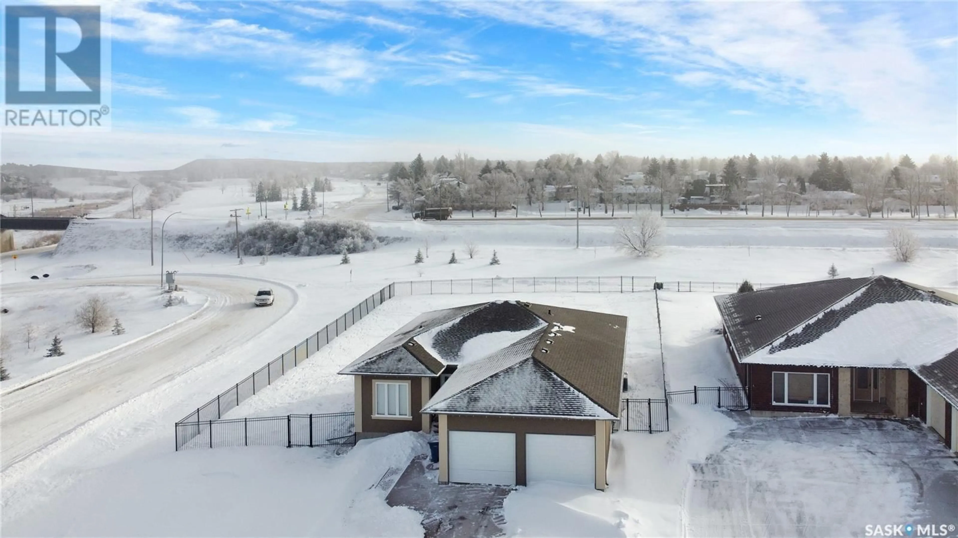 A pic from outside/outdoor area/front of a property/back of a property/a pic from drone, unknown for 3 Iron Bridge TERRACE, Moose Jaw Saskatchewan S6J0B5