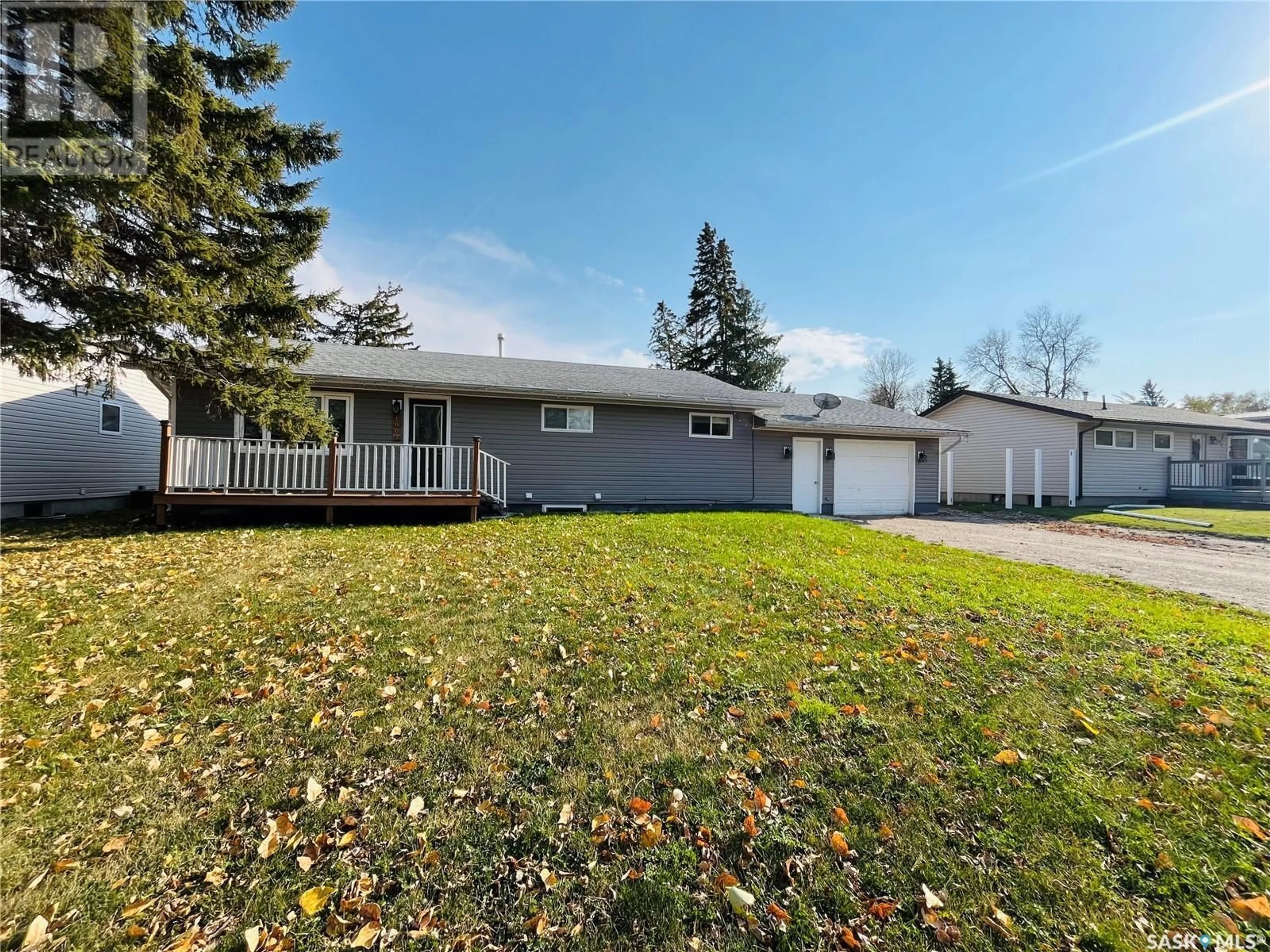 Home with vinyl exterior material, street for 1007 Carleton STREET, Moosomin Saskatchewan S0G3N0