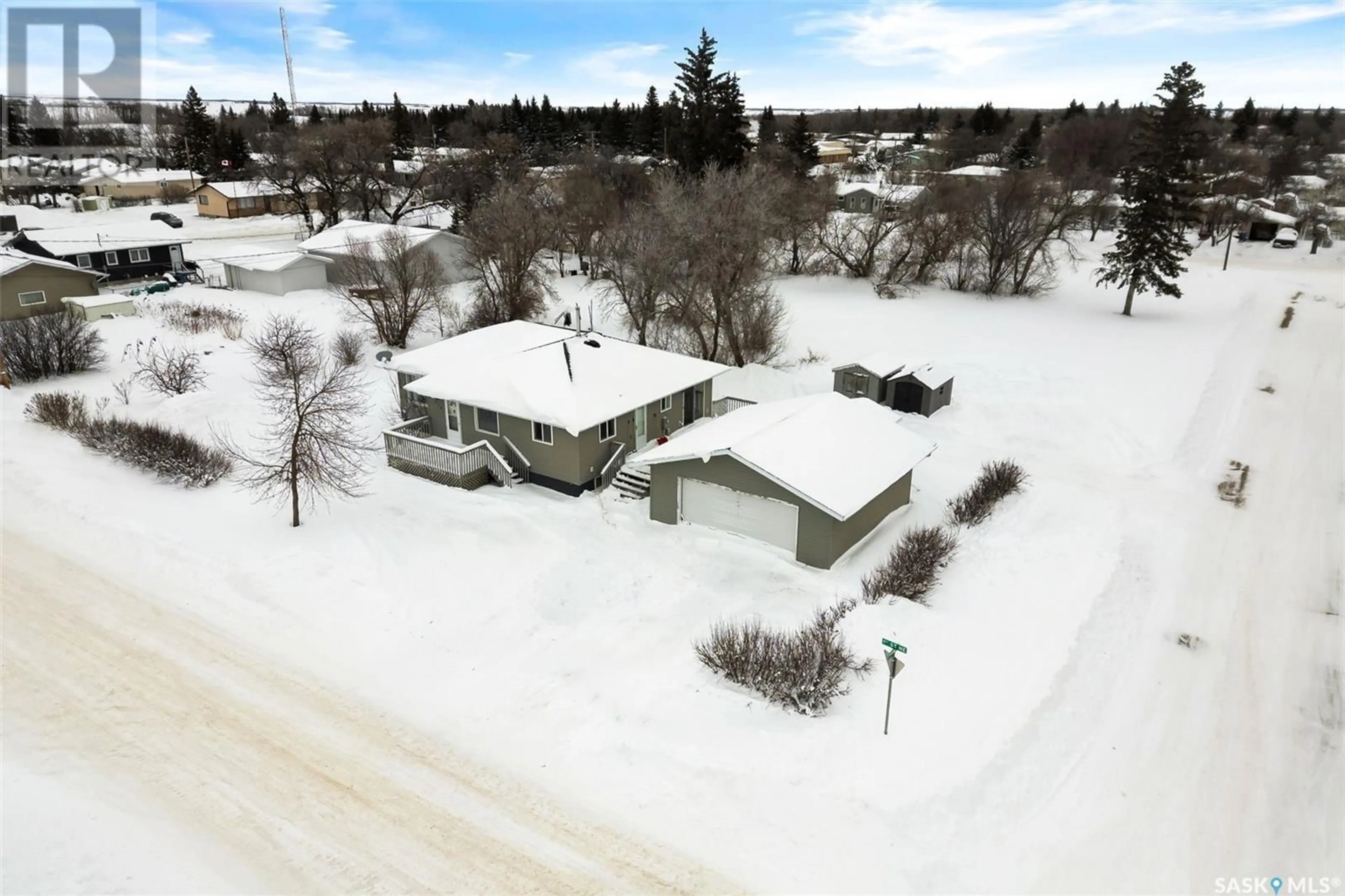 A pic from outside/outdoor area/front of a property/back of a property/a pic from drone, street for 310 1st STREET NE, Ituna Saskatchewan S0A1N0