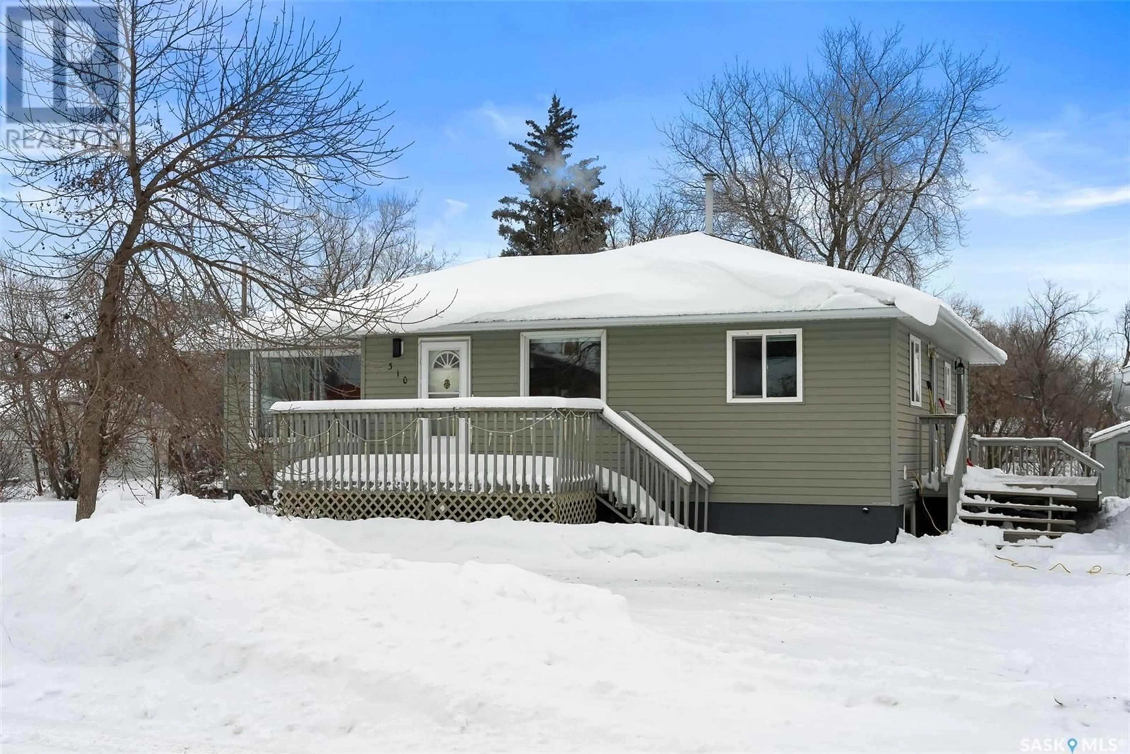 Home with vinyl exterior material, street for 310 1st STREET NE, Ituna Saskatchewan S0A1N0