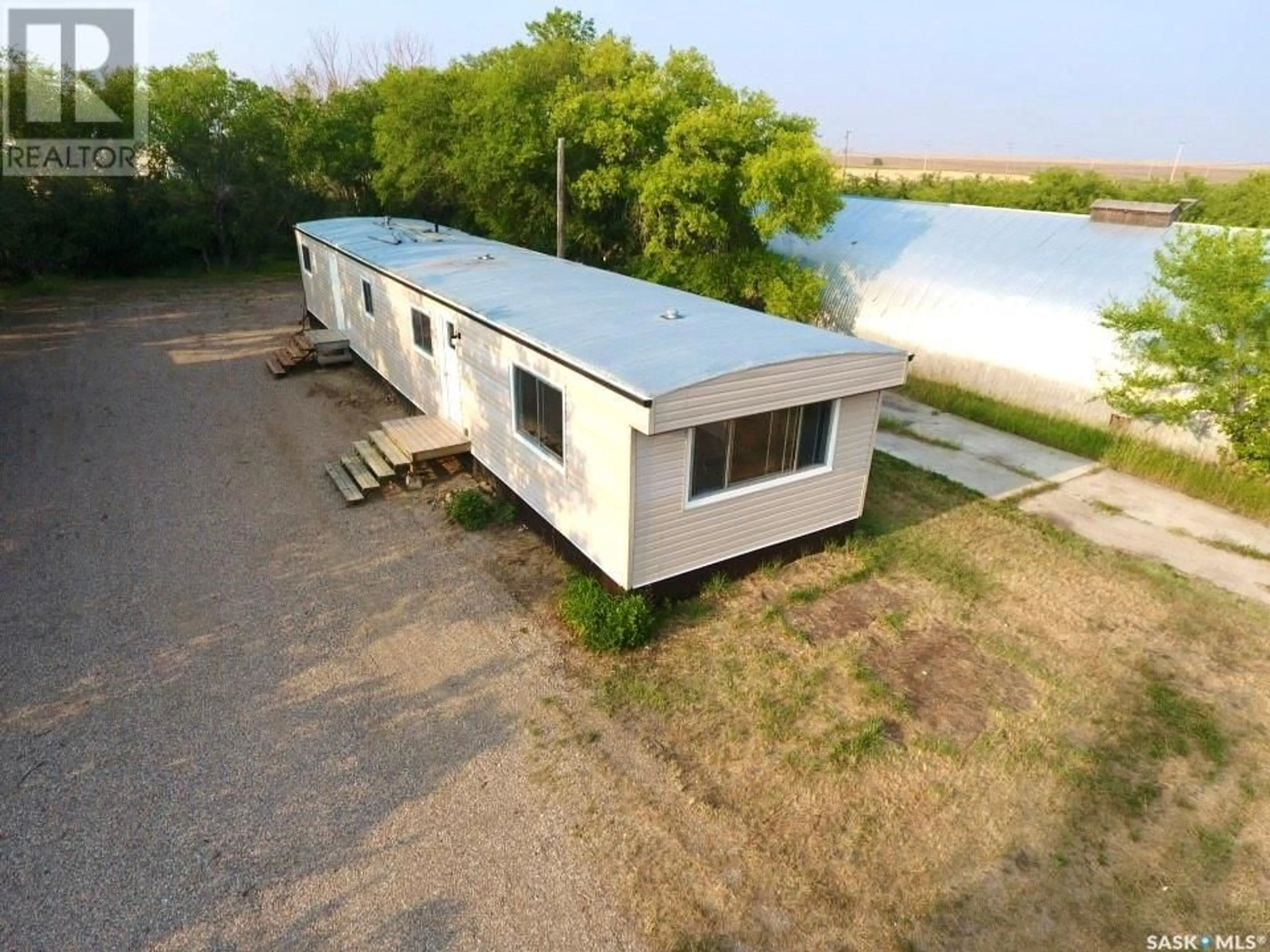 A pic from outside/outdoor area/front of a property/back of a property/a pic from drone, building for 216 Herbert STREET, Hawarden Saskatchewan S0H1Y0