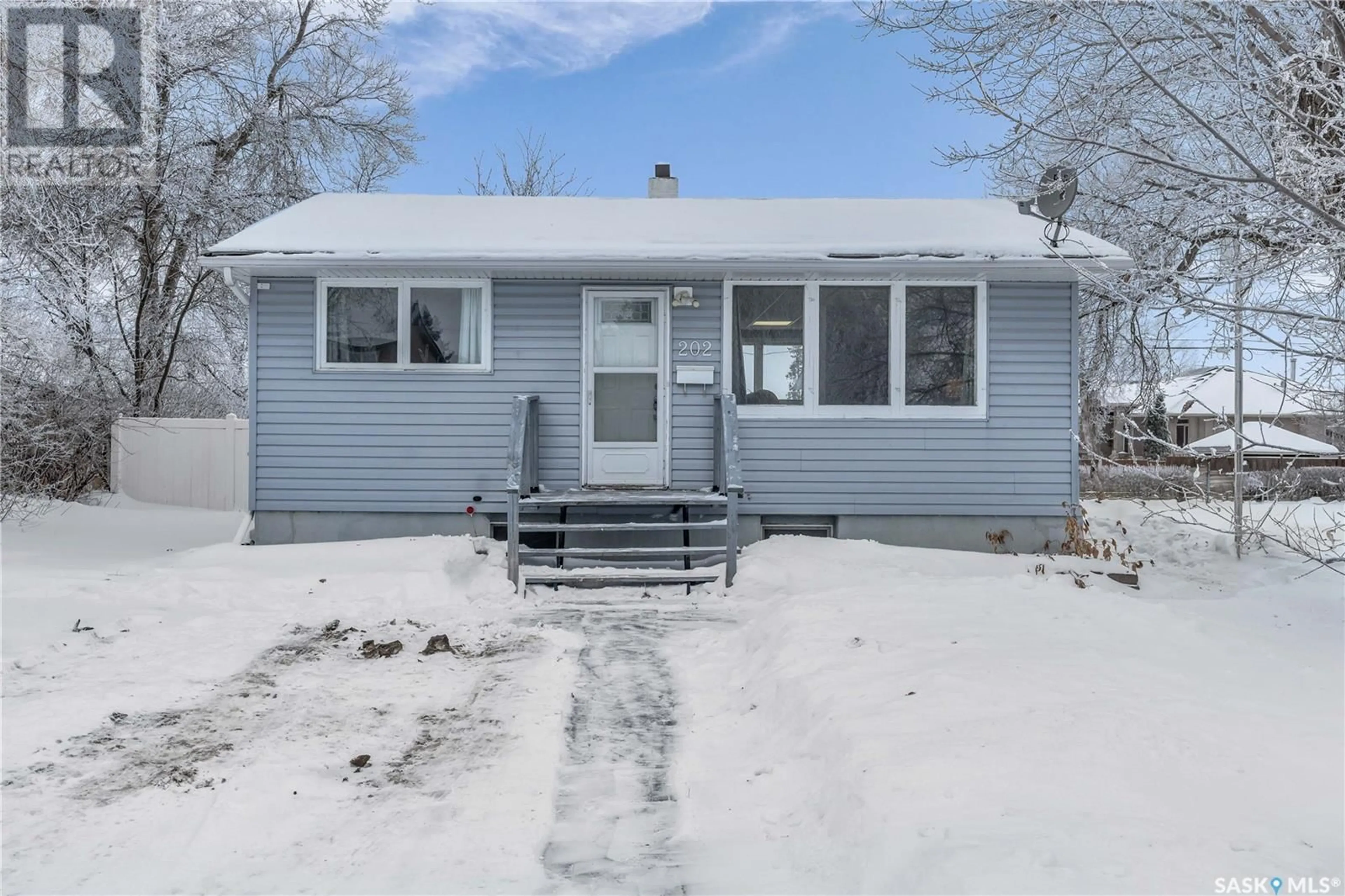 Home with vinyl exterior material, street for 202 Lewis STREET, Balgonie Saskatchewan S0G0E0