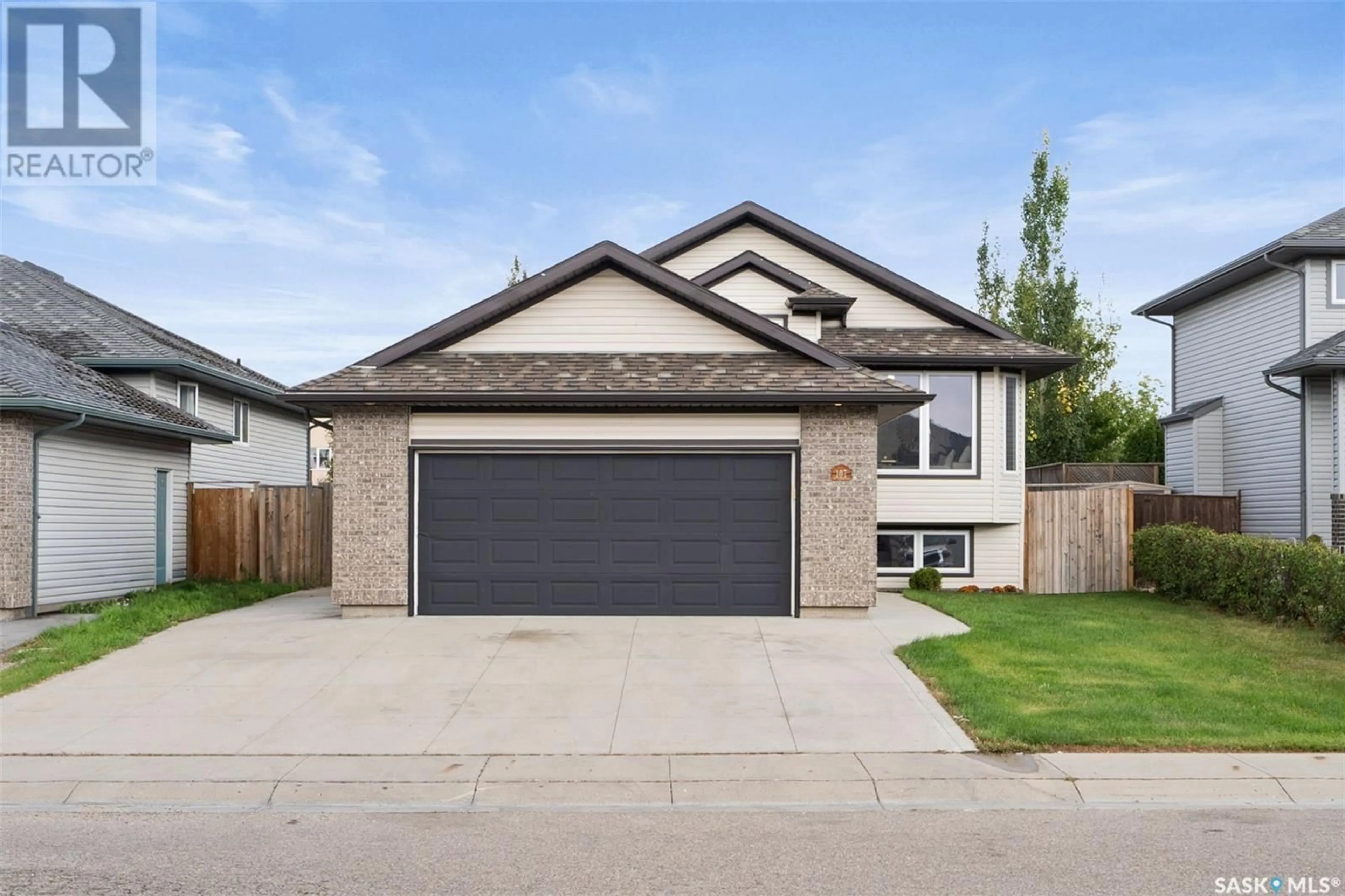 Home with vinyl exterior material, street for 107 Allwood CRESCENT, Saskatoon Saskatchewan S7R0A3