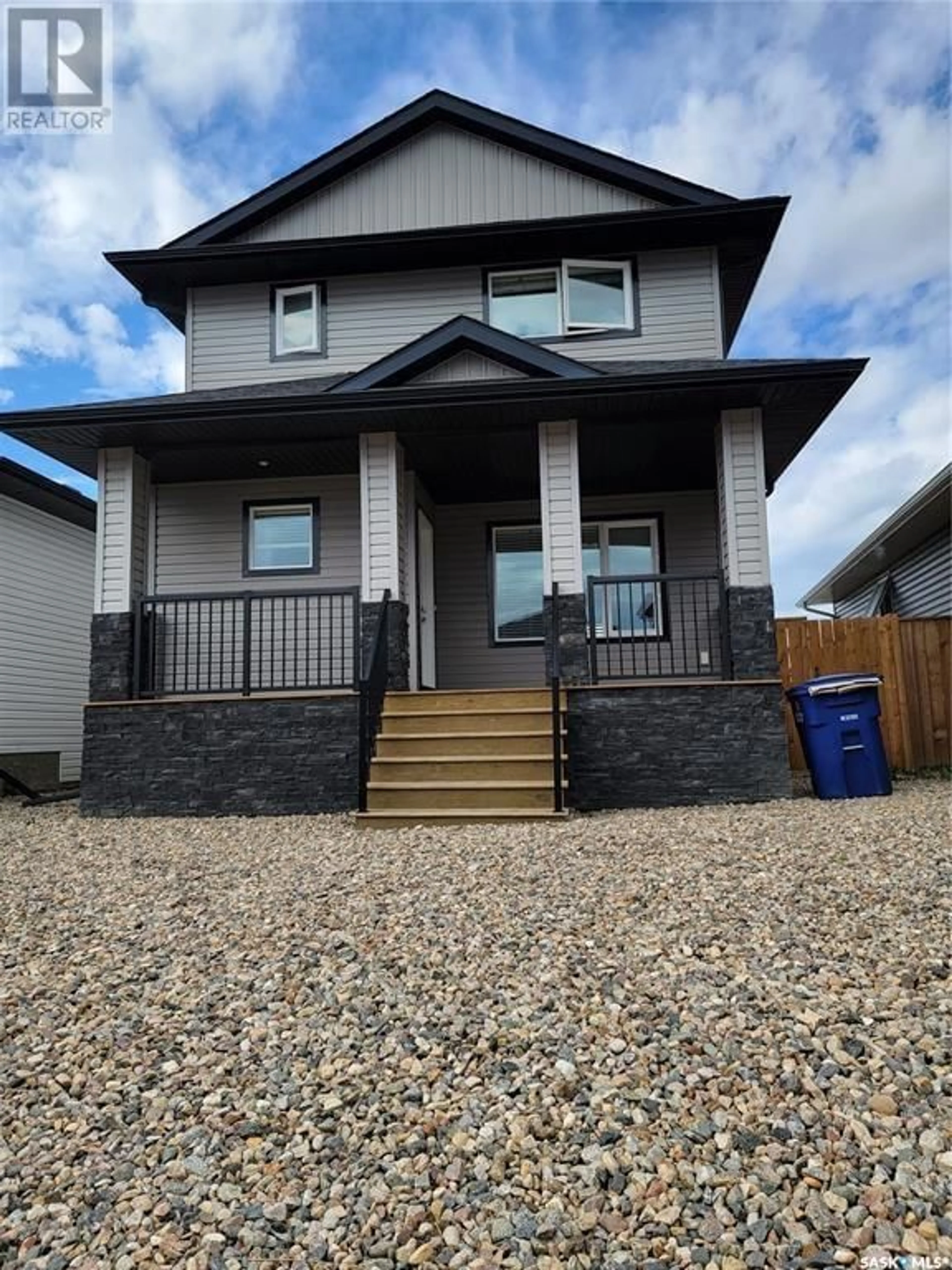 Home with vinyl exterior material, street for 1062 Kloppenburg BEND, Saskatoon Saskatchewan S7W0P4