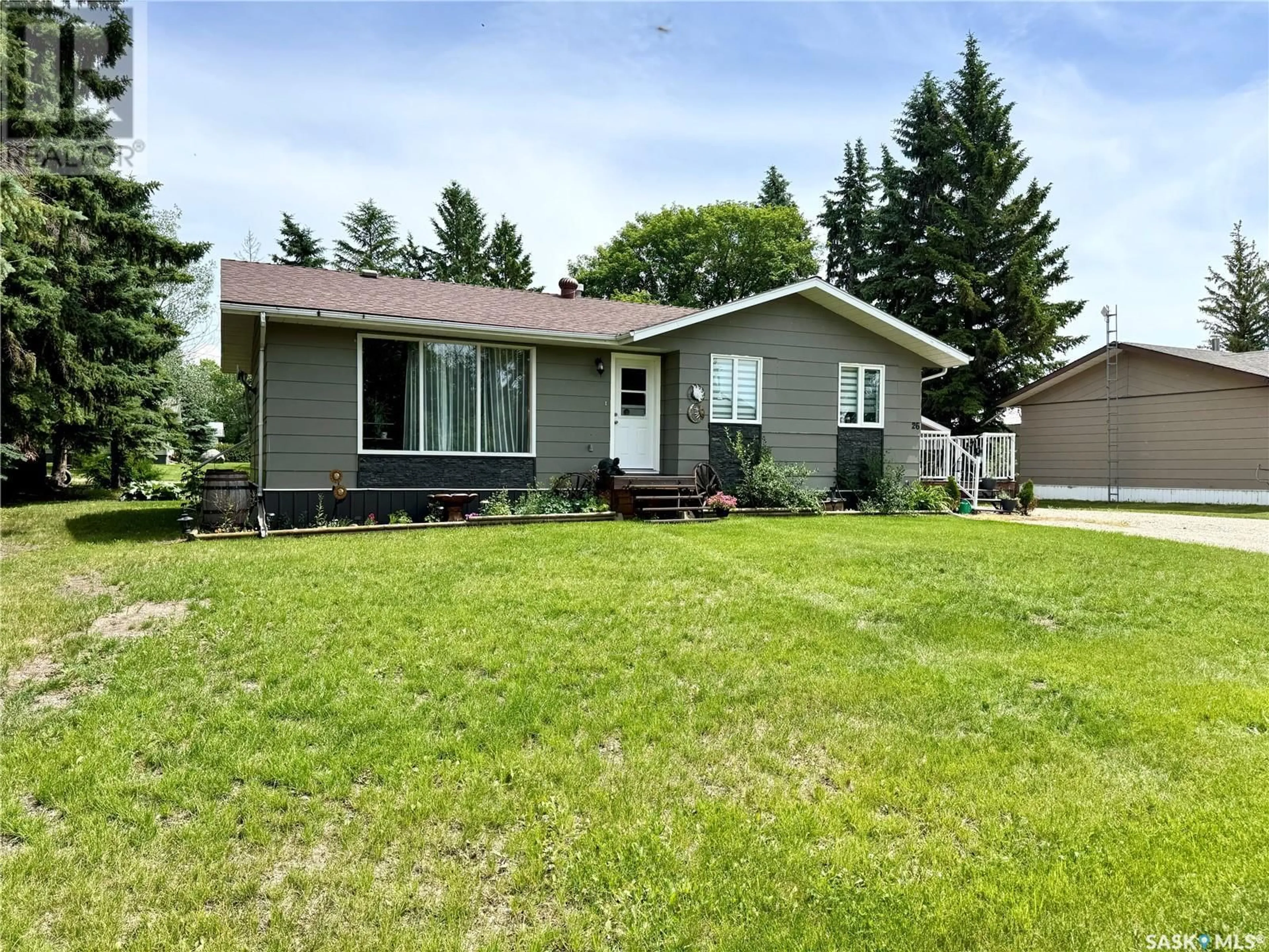 Home with vinyl exterior material, street for 26 NOEL STREET, Dubuc Saskatchewan S0A0R0