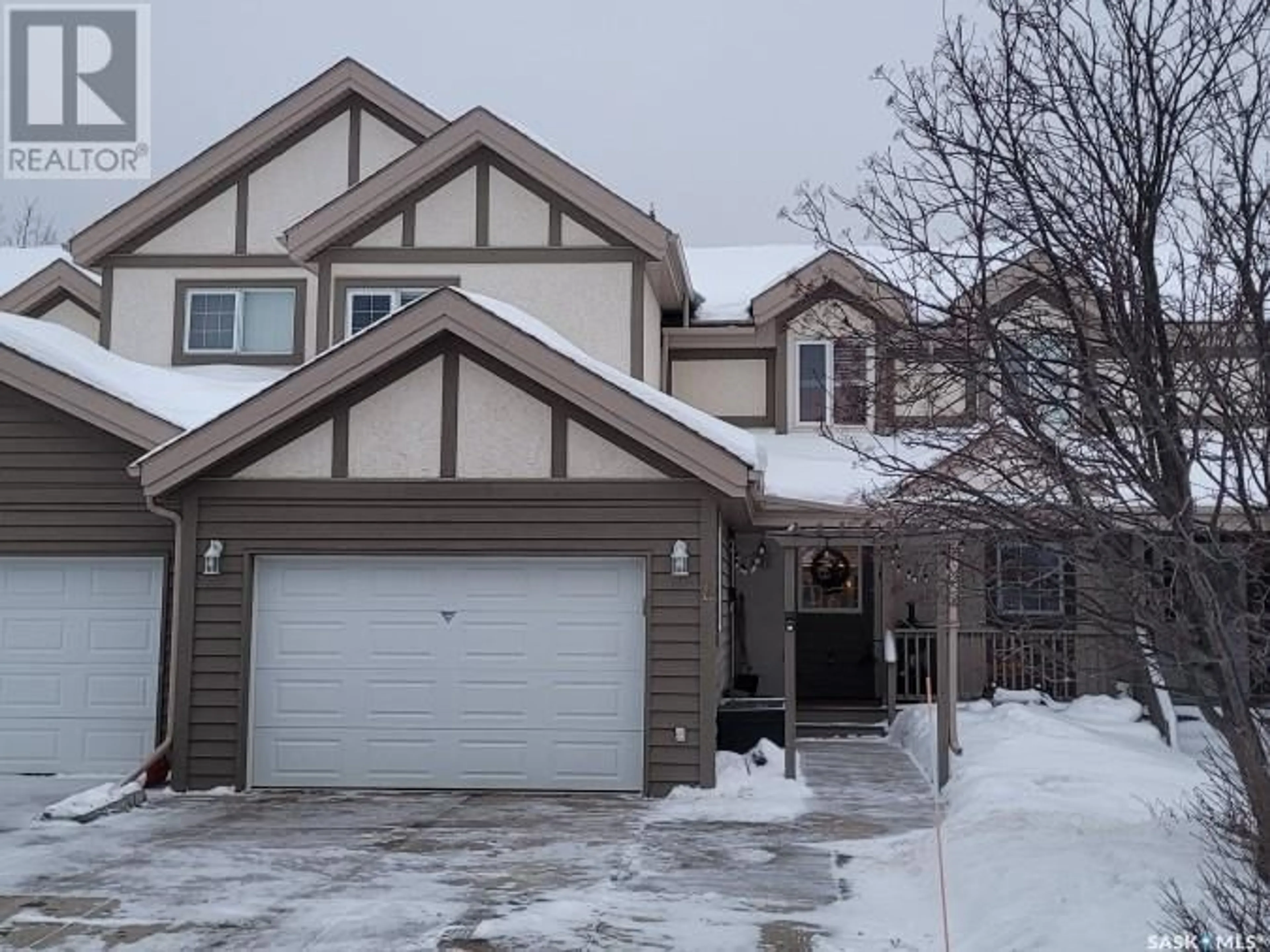 Home with vinyl exterior material, street for 6 EAGLE VIEW WAY, Elk Ridge Saskatchewan S0J0N0