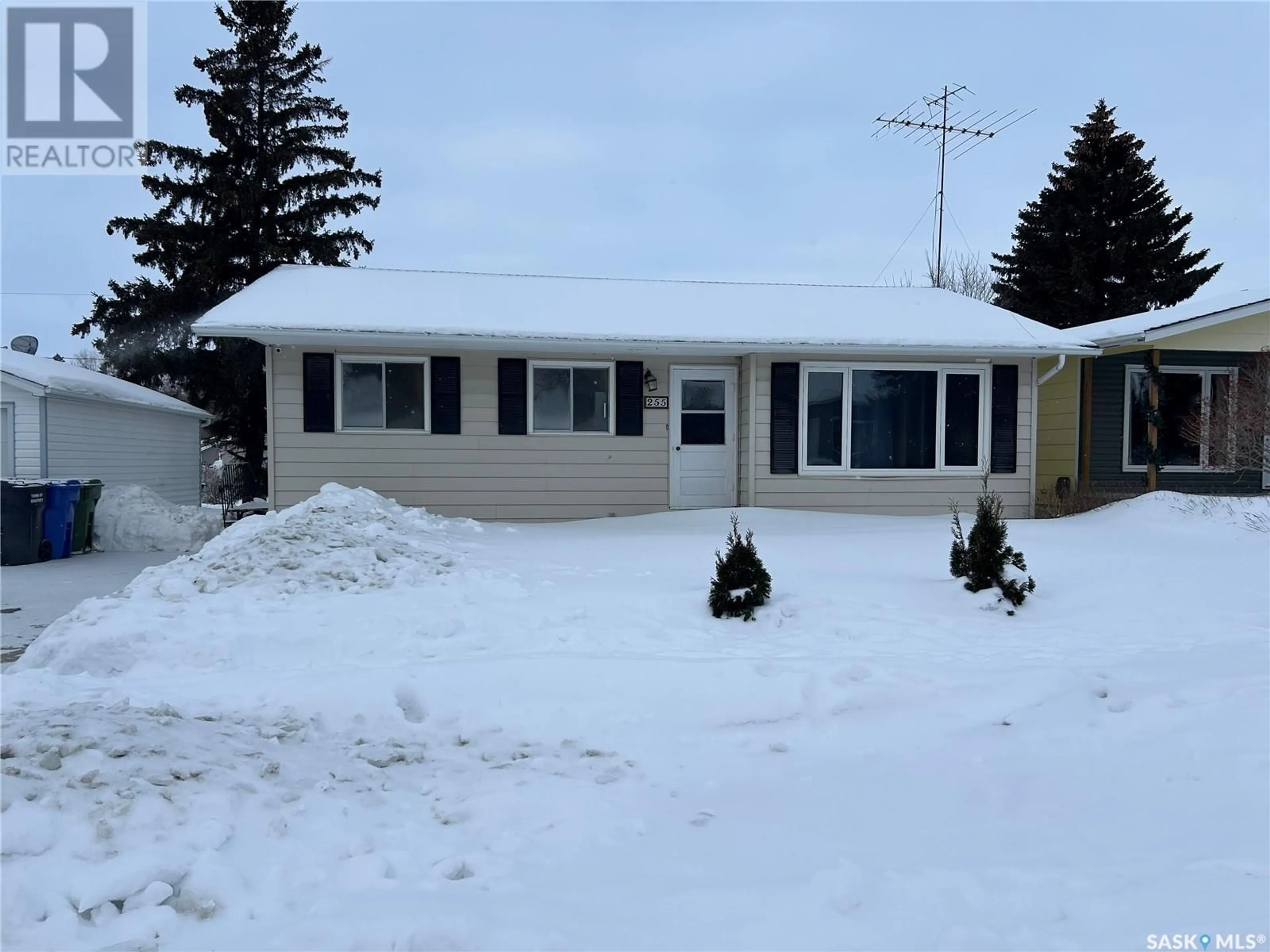 Home with vinyl exterior material, street for 255 Browning STREET, Southey Saskatchewan S0G4P0