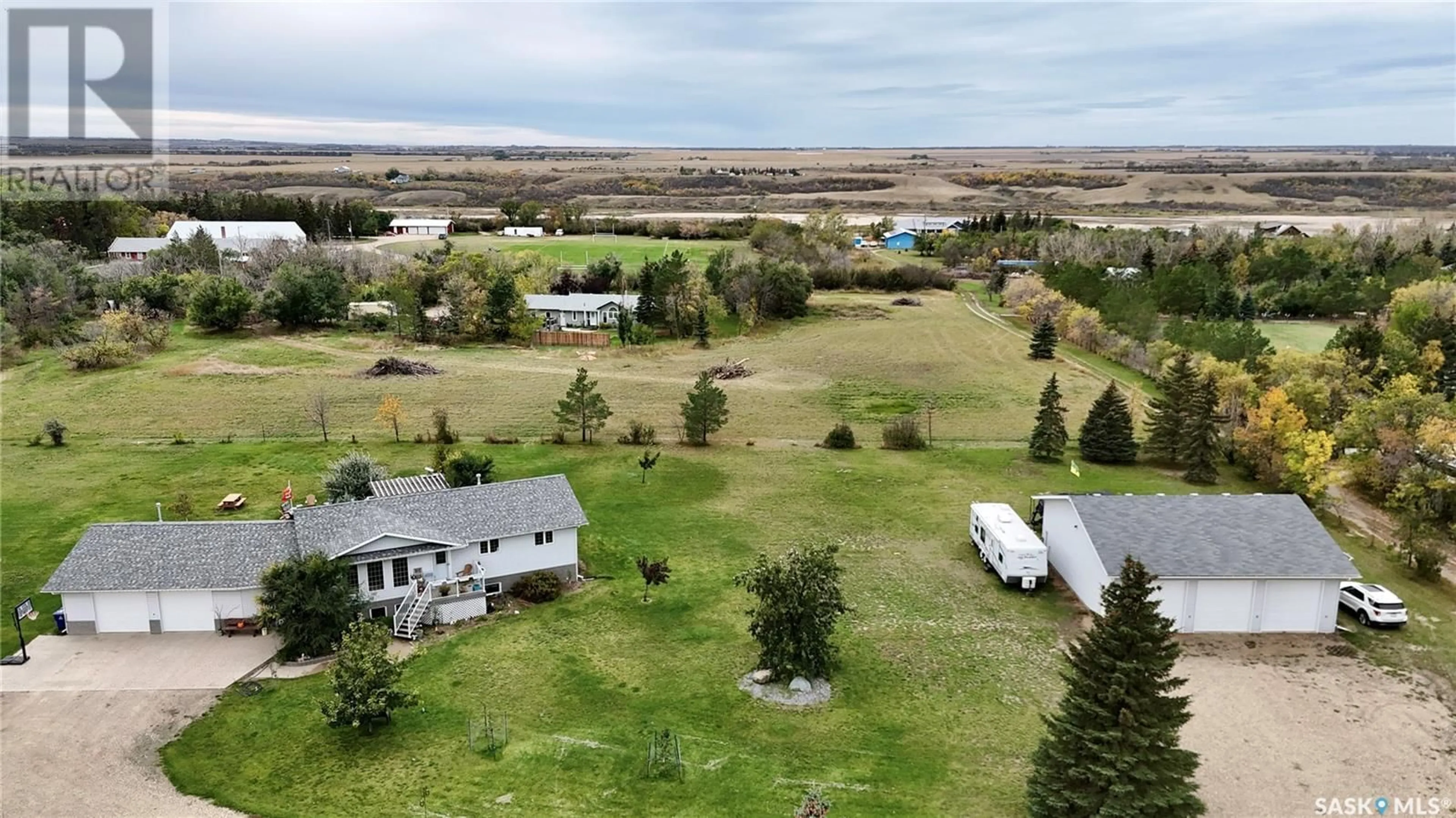 A pic from outside/outdoor area/front of a property/back of a property/a pic from drone, unknown for 800 McKenzie STREET N, Outlook Saskatchewan S0L2N0