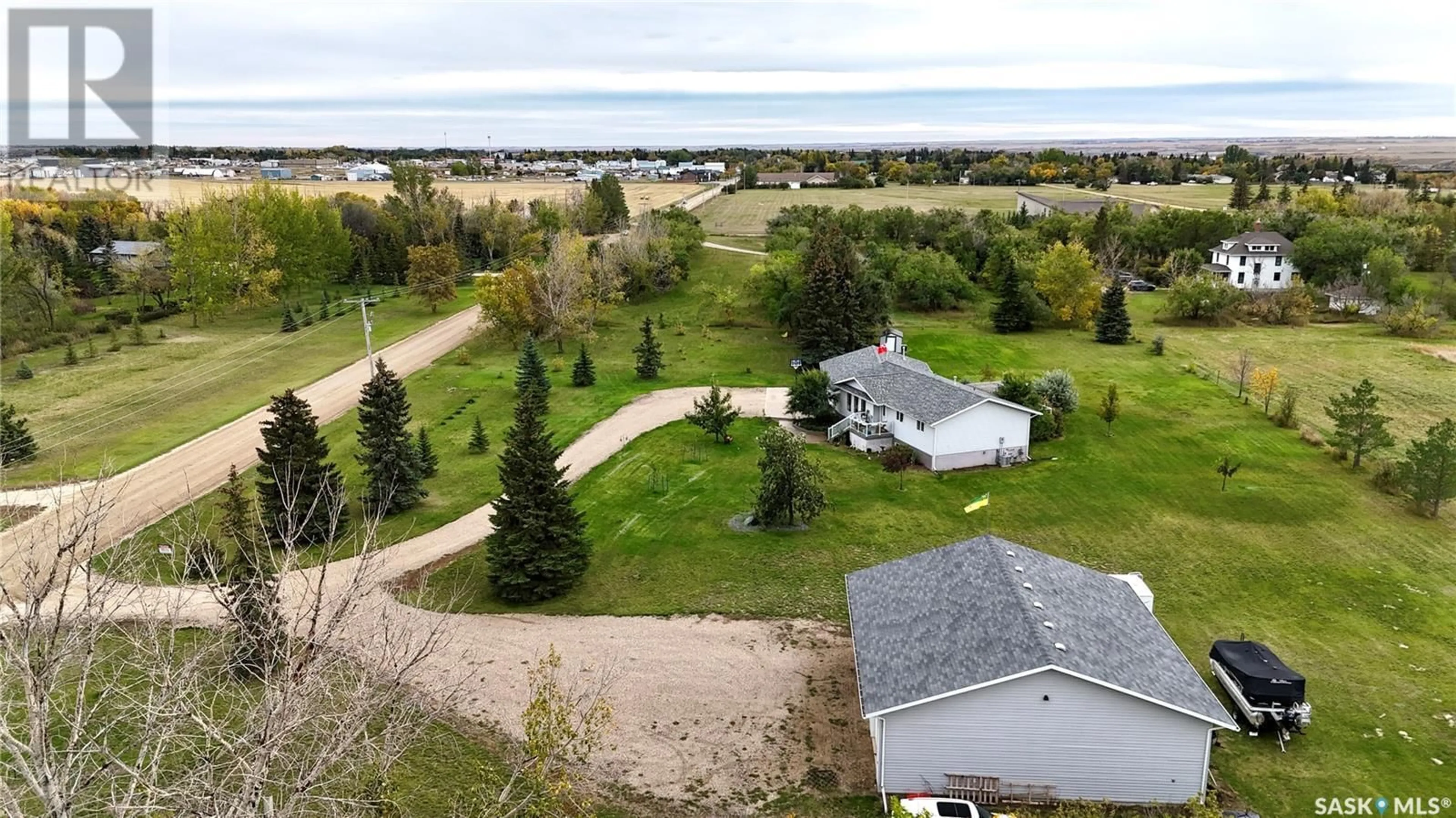 A pic from outside/outdoor area/front of a property/back of a property/a pic from drone, water/lake/river/ocean view for 800 McKenzie STREET N, Outlook Saskatchewan S0L2N0