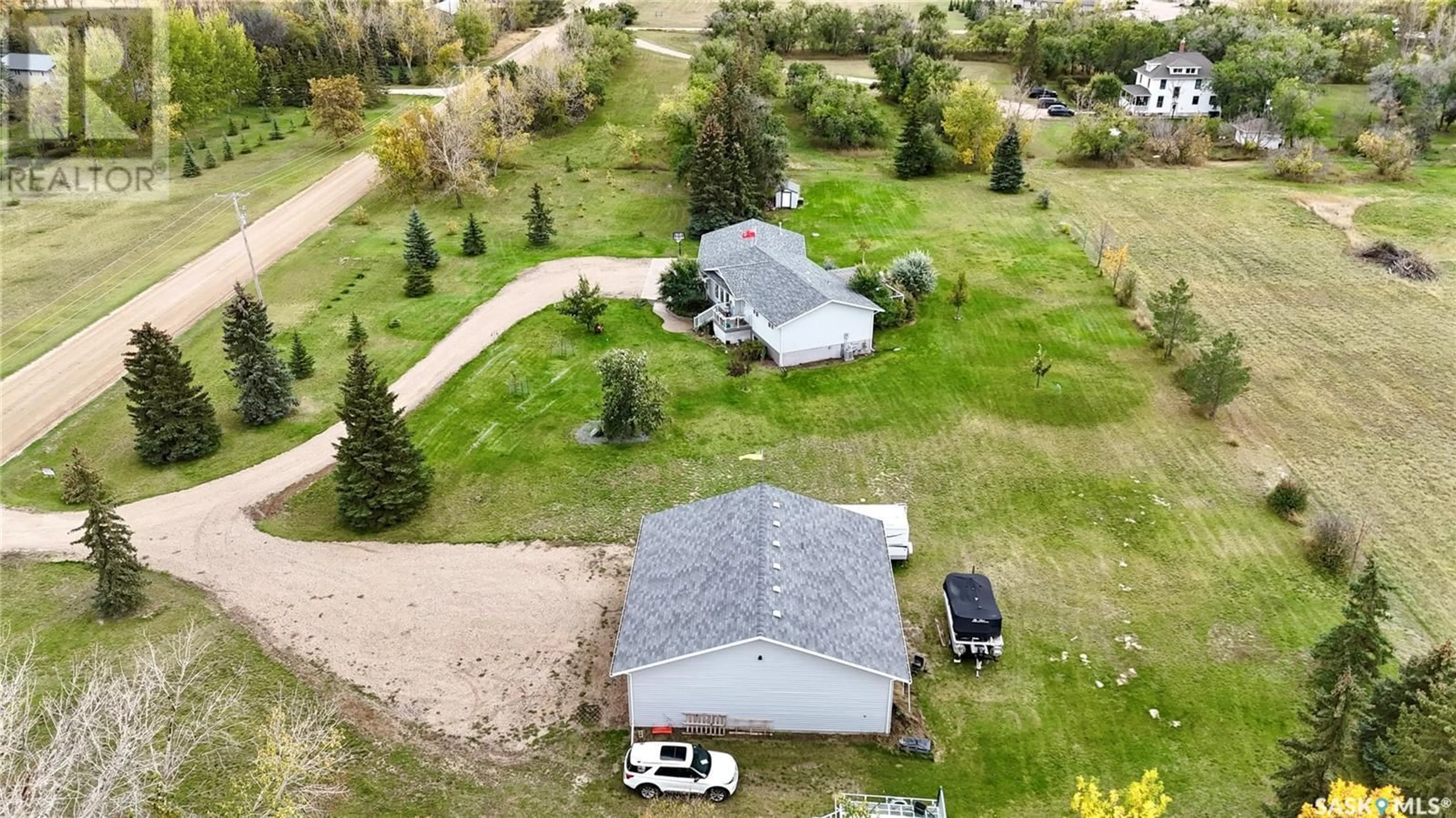 A pic from outside/outdoor area/front of a property/back of a property/a pic from drone, street for 800 McKenzie STREET N, Outlook Saskatchewan S0L2N0