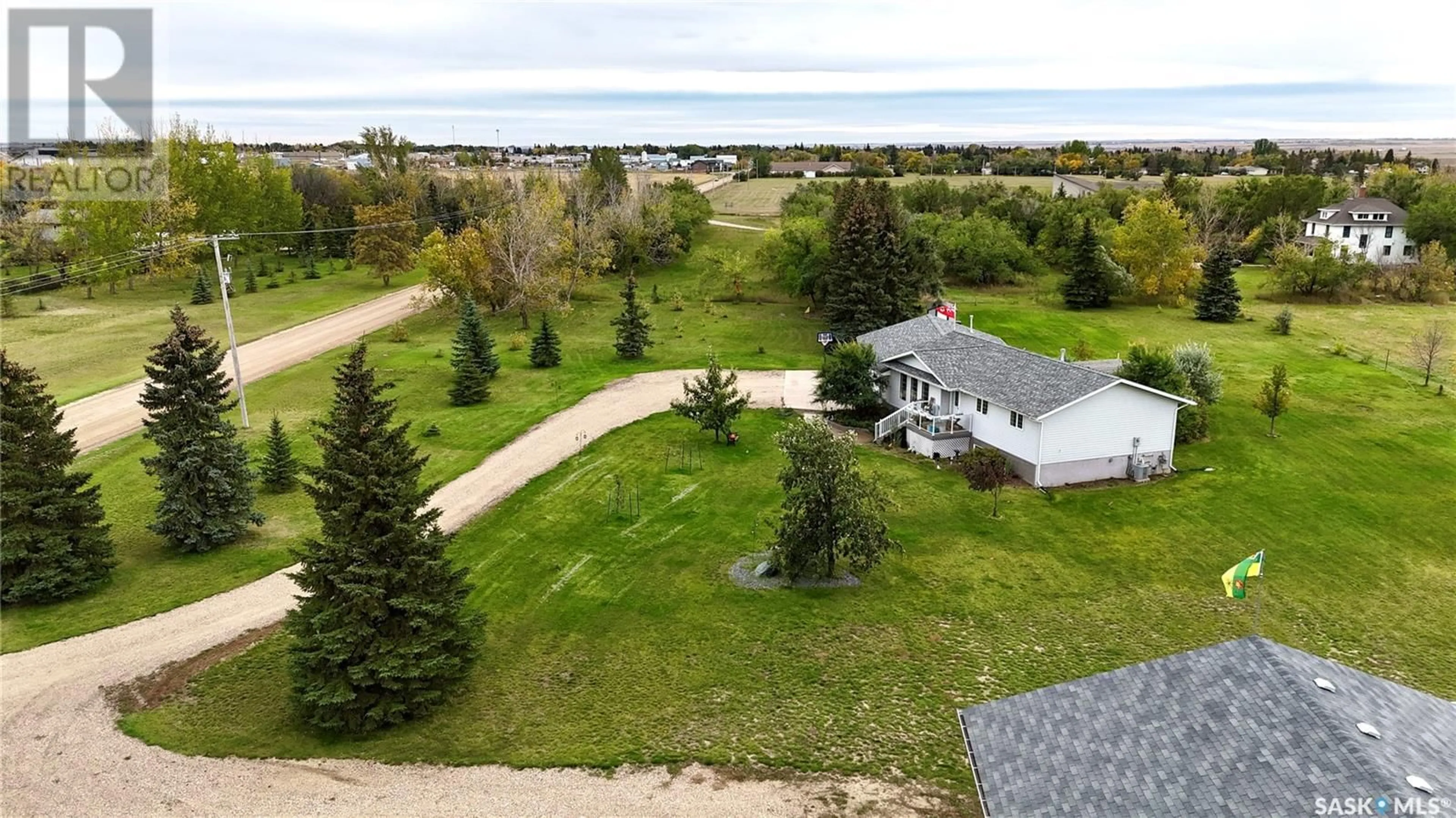 A pic from outside/outdoor area/front of a property/back of a property/a pic from drone, water/lake/river/ocean view for 800 McKenzie STREET N, Outlook Saskatchewan S0L2N0