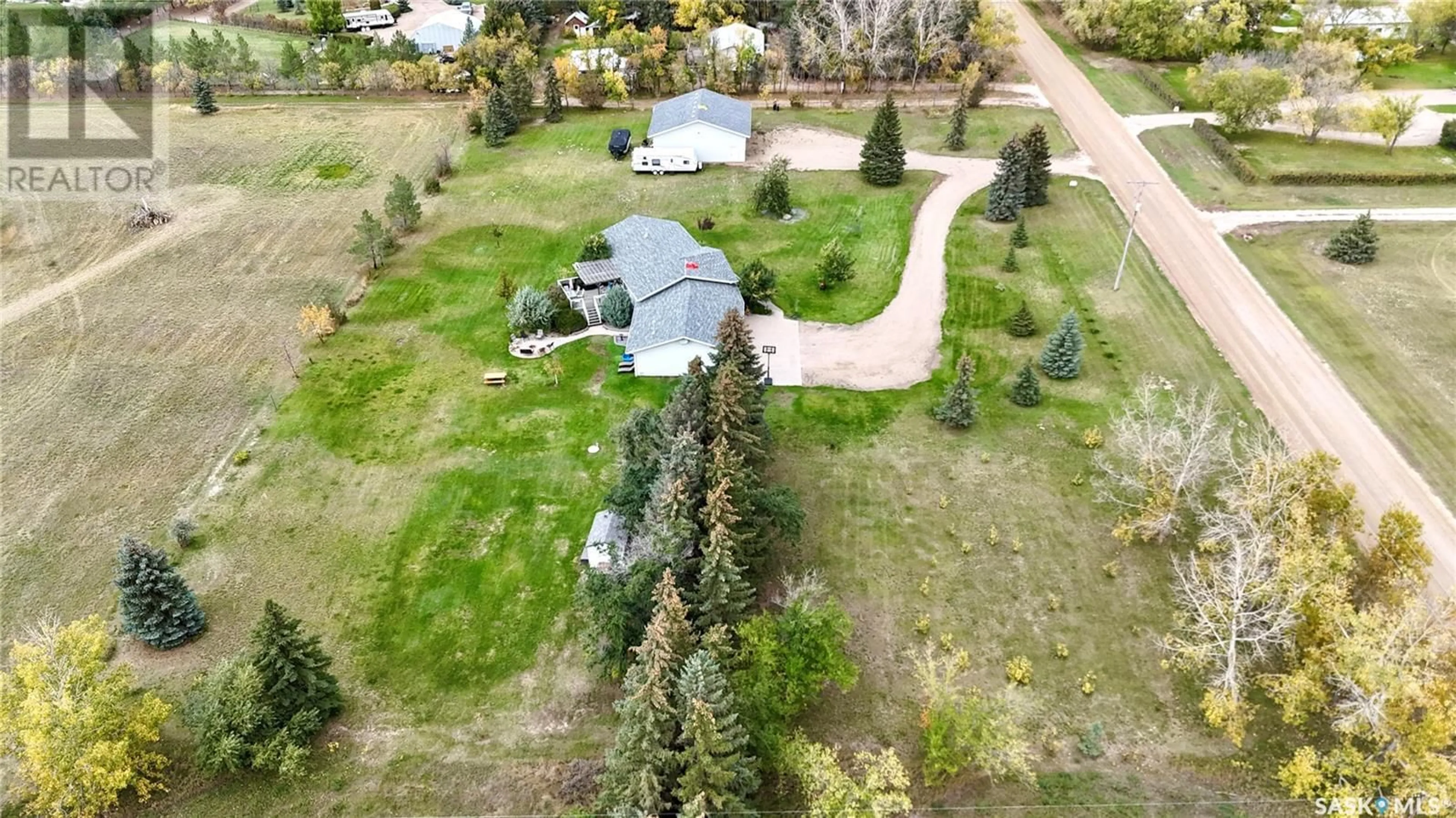 A pic from outside/outdoor area/front of a property/back of a property/a pic from drone, street for 800 McKenzie STREET N, Outlook Saskatchewan S0L2N0