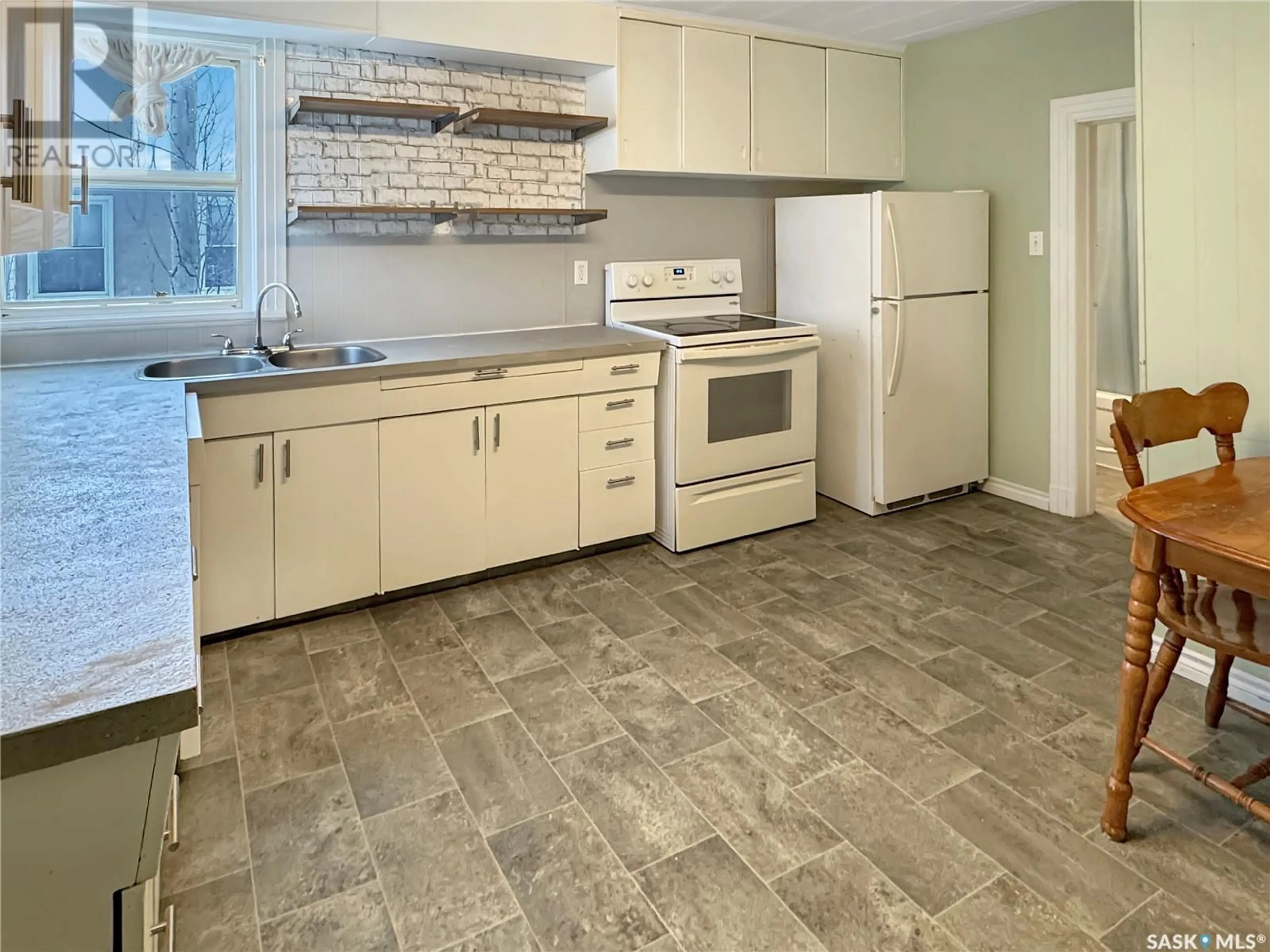 Standard kitchen, ceramic/tile floor for 1441 103rd STREET, North Battleford Saskatchewan S9A1L2