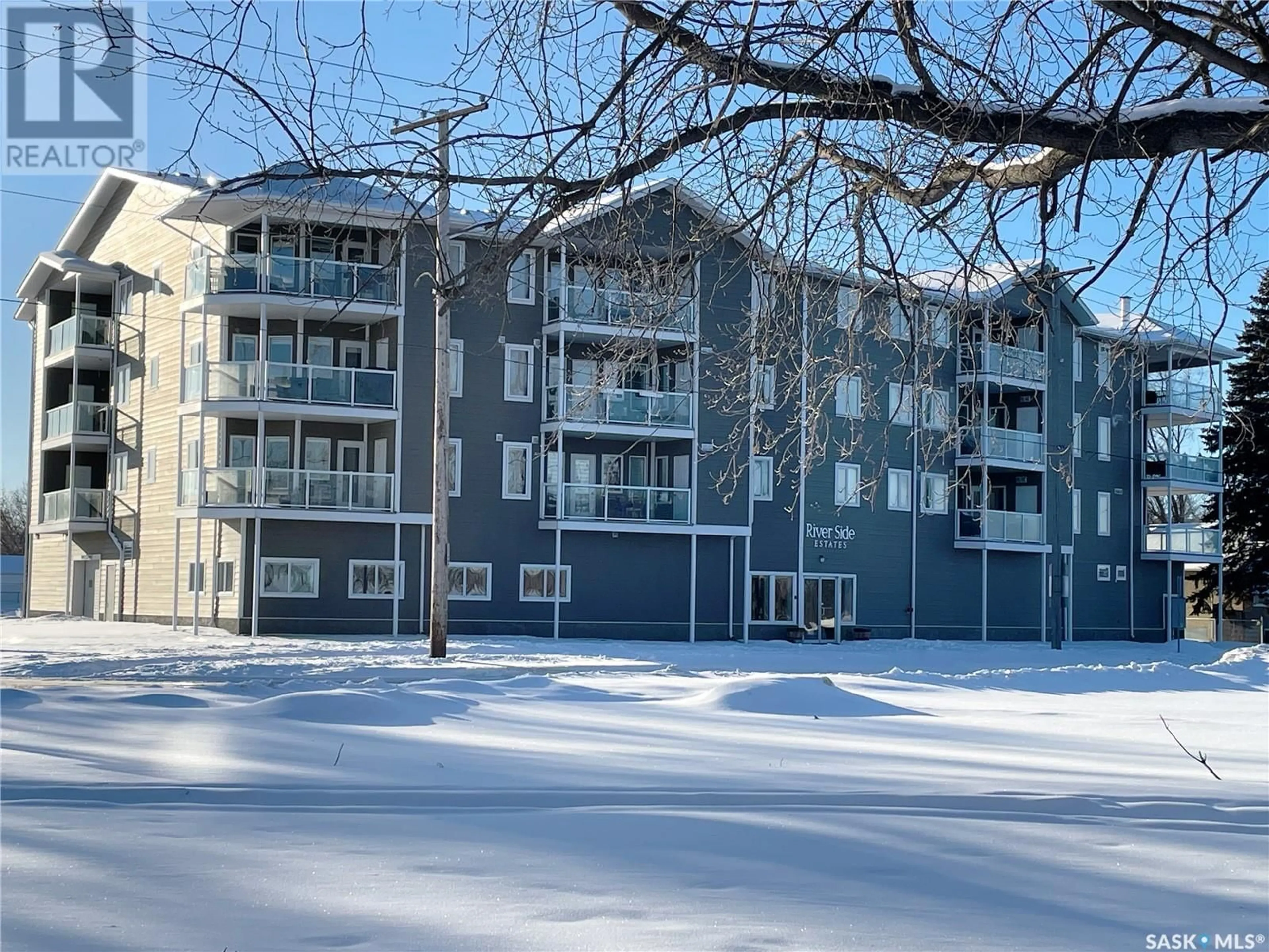 A pic from outside/outdoor area/front of a property/back of a property/a pic from drone, building for 201 395 River STREET E, Prince Albert Saskatchewan S6V0A3