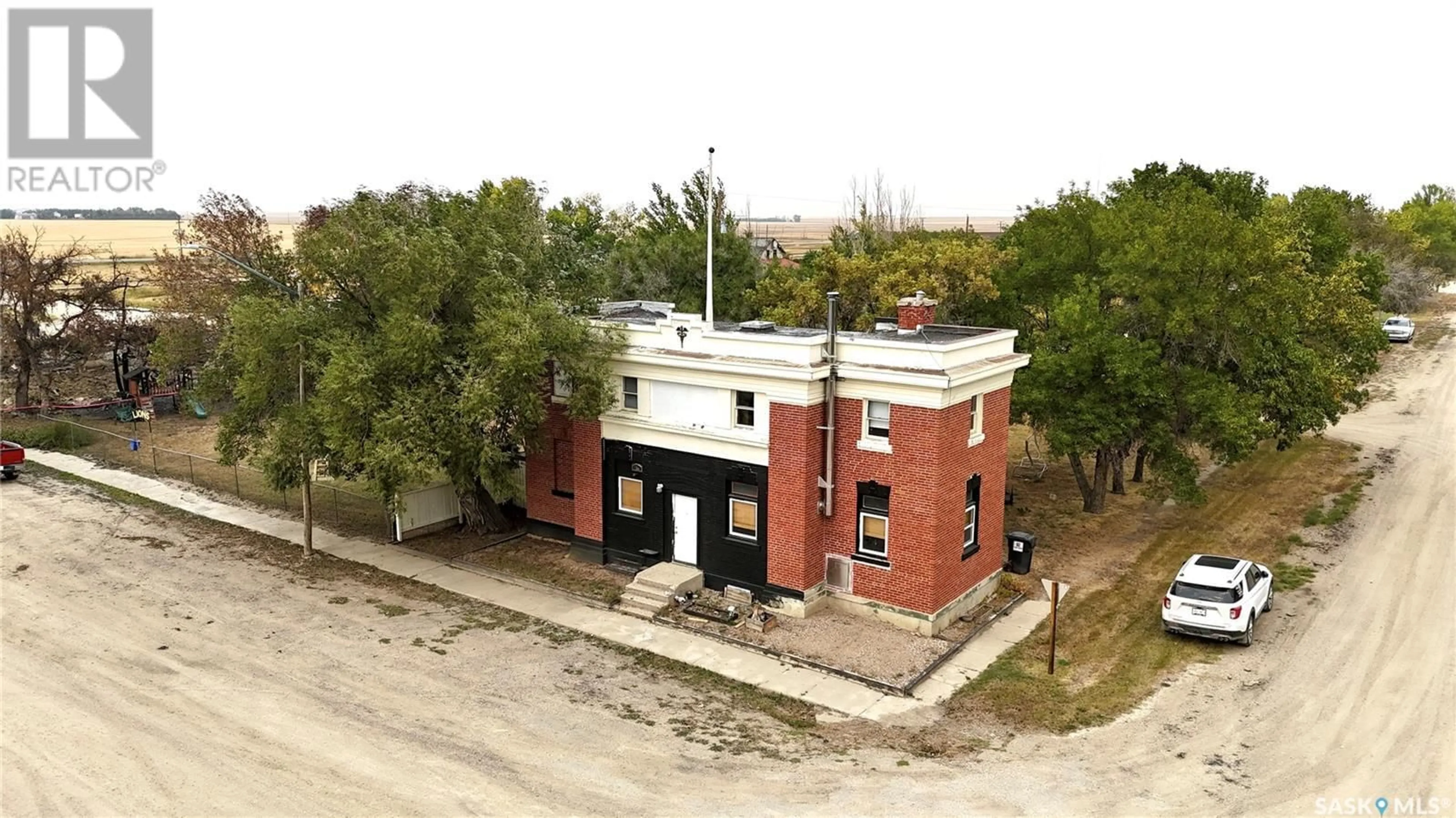 A pic from outside/outdoor area/front of a property/back of a property/a pic from drone, building for 116 Main Street, Wiseton Saskatchewan S0L3M0