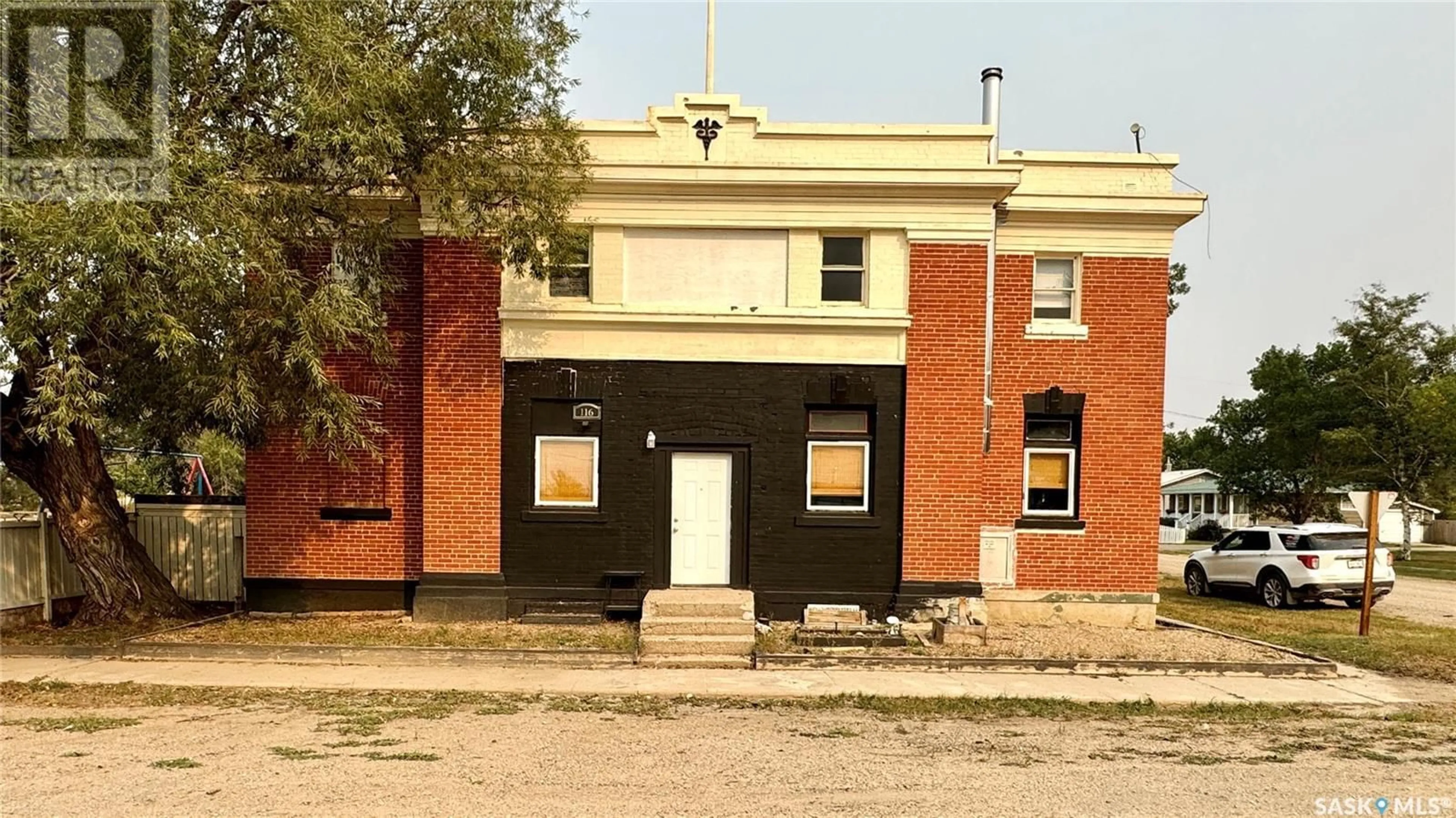 Home with brick exterior material, building for 116 Main Street, Wiseton Saskatchewan S0L3M0