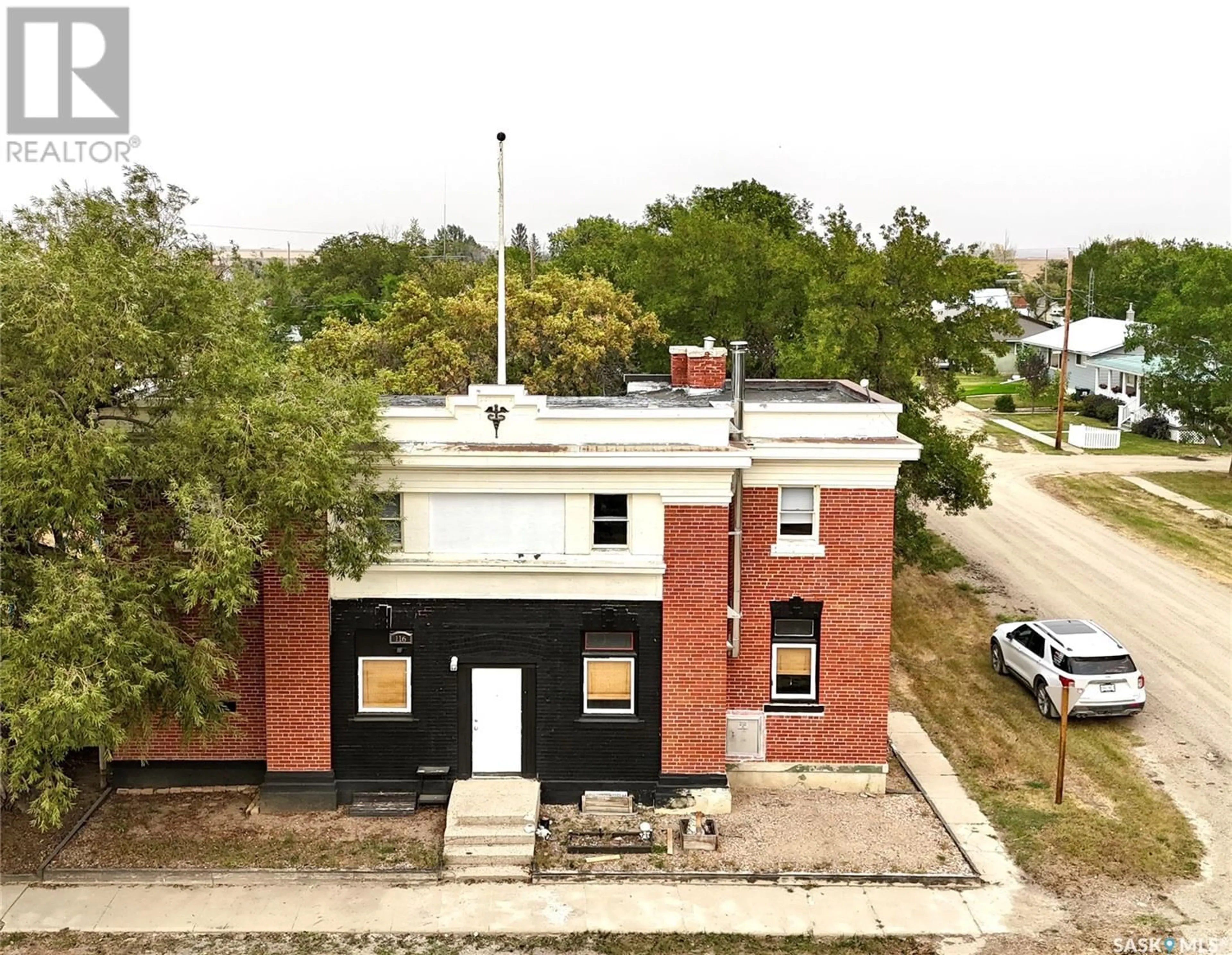 A pic from outside/outdoor area/front of a property/back of a property/a pic from drone, building for 116 Main Street, Wiseton Saskatchewan S0L3M0