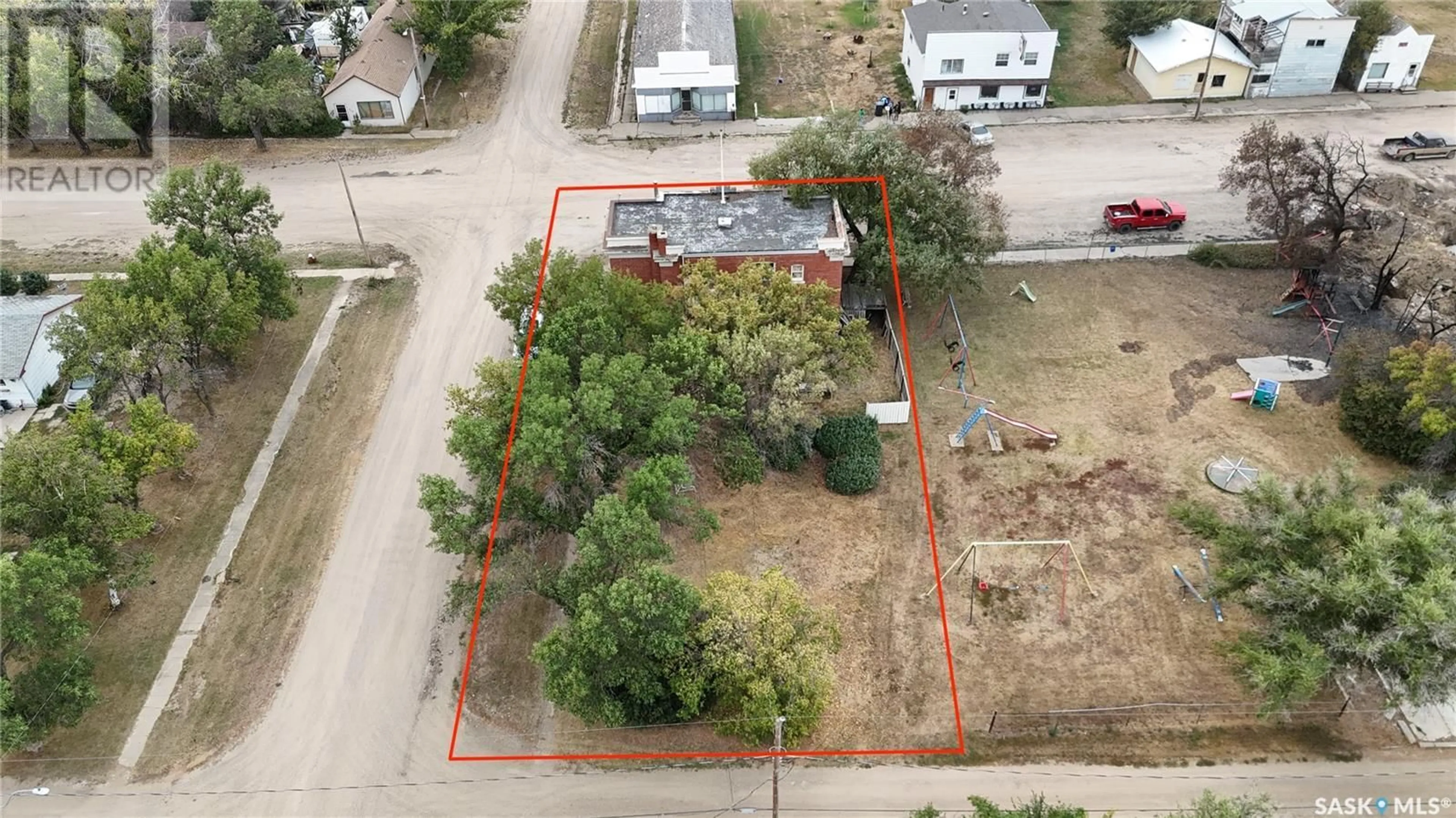 A pic from outside/outdoor area/front of a property/back of a property/a pic from drone, building for 116 Main Street, Wiseton Saskatchewan S0L3M0