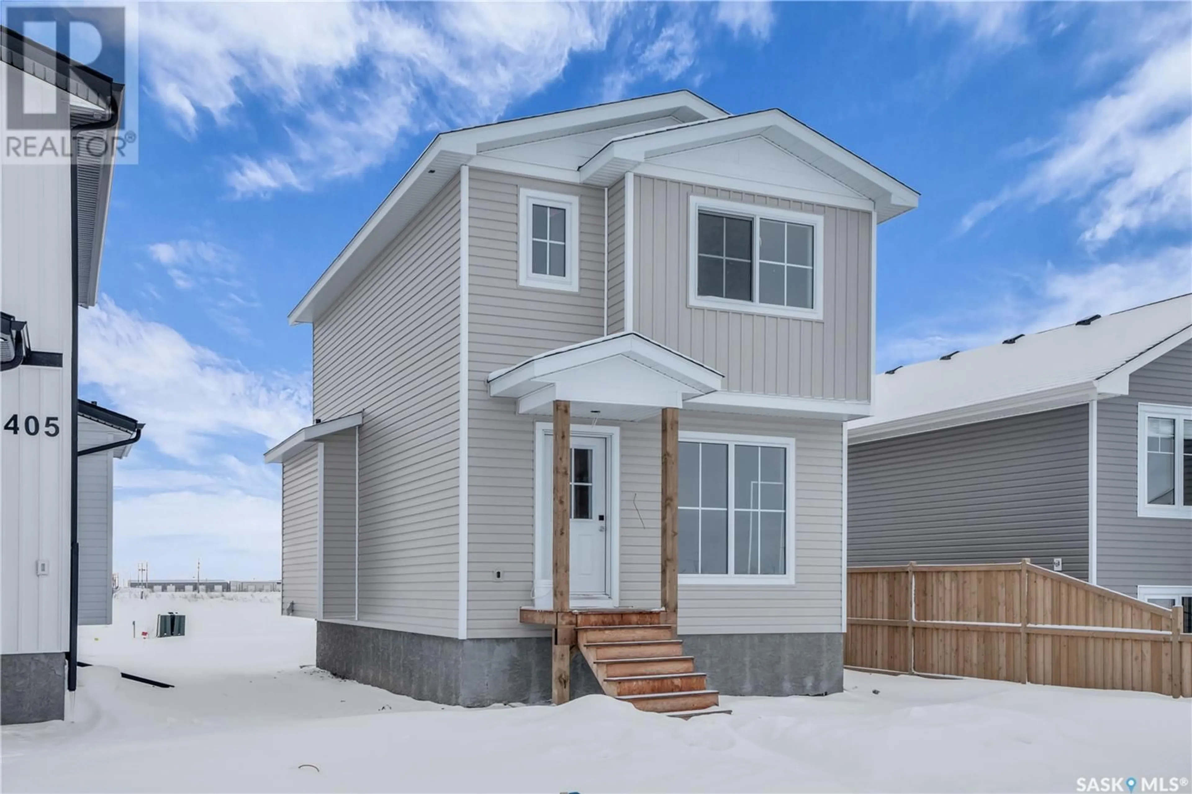 Home with vinyl exterior material, street for 407 Eldorado STREET, Warman Saskatchewan S0K4S0