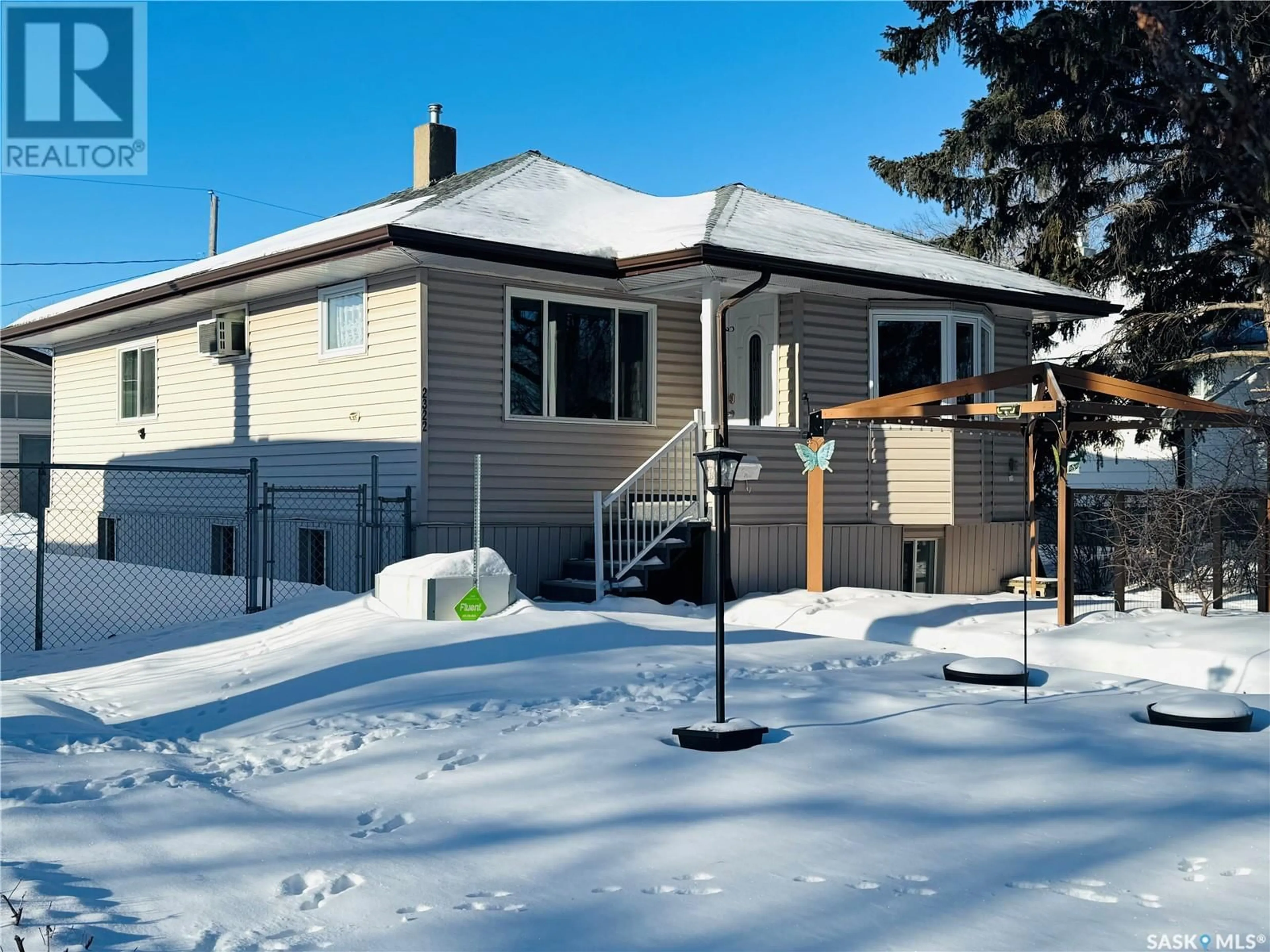 Home with vinyl exterior material, street for 2322 MacKay STREET, Regina Saskatchewan S4N2T1