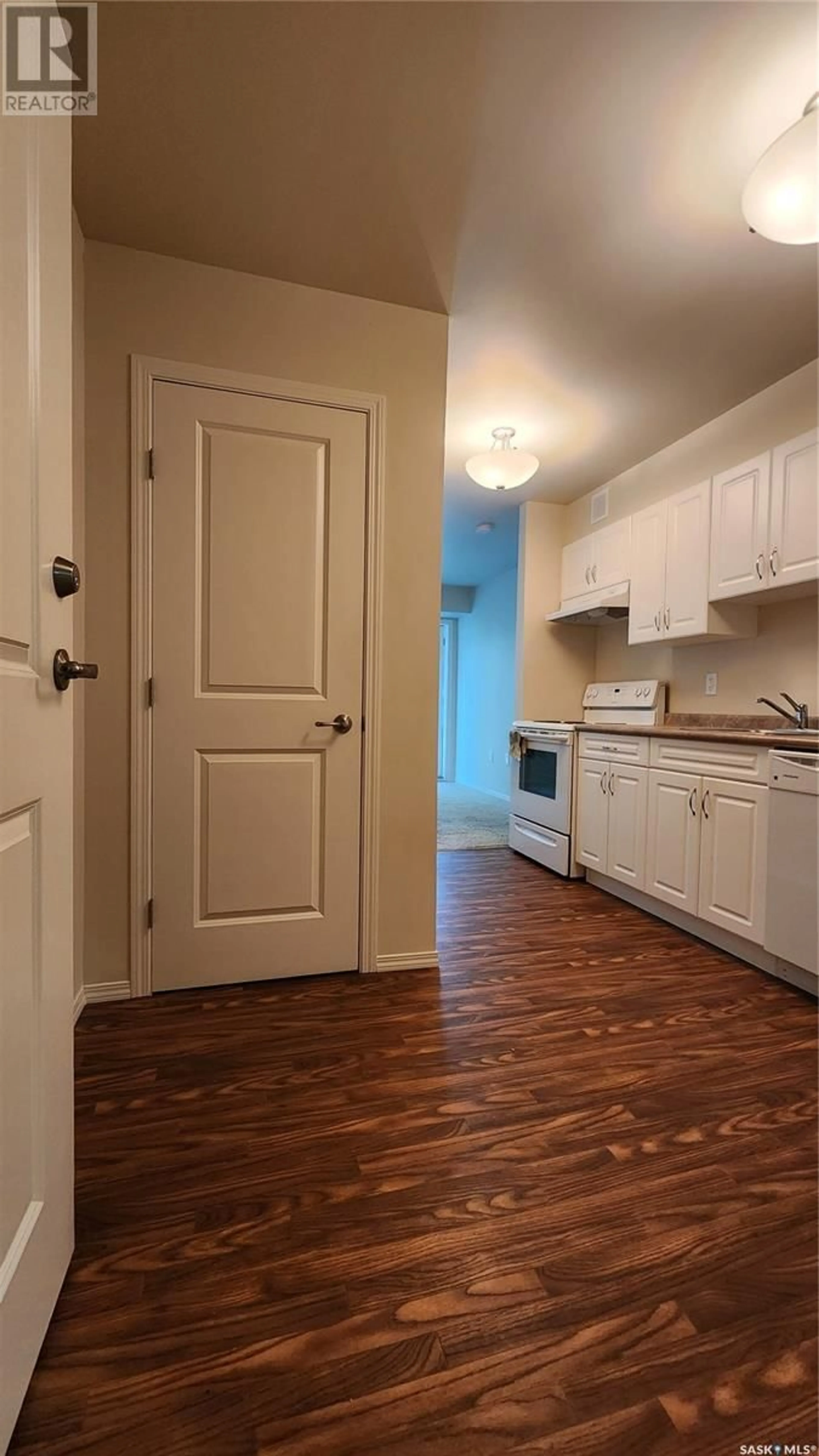 Standard kitchen, wood/laminate floor for 323 680 7th AVENUE E, Melville Saskatchewan S0A2P0