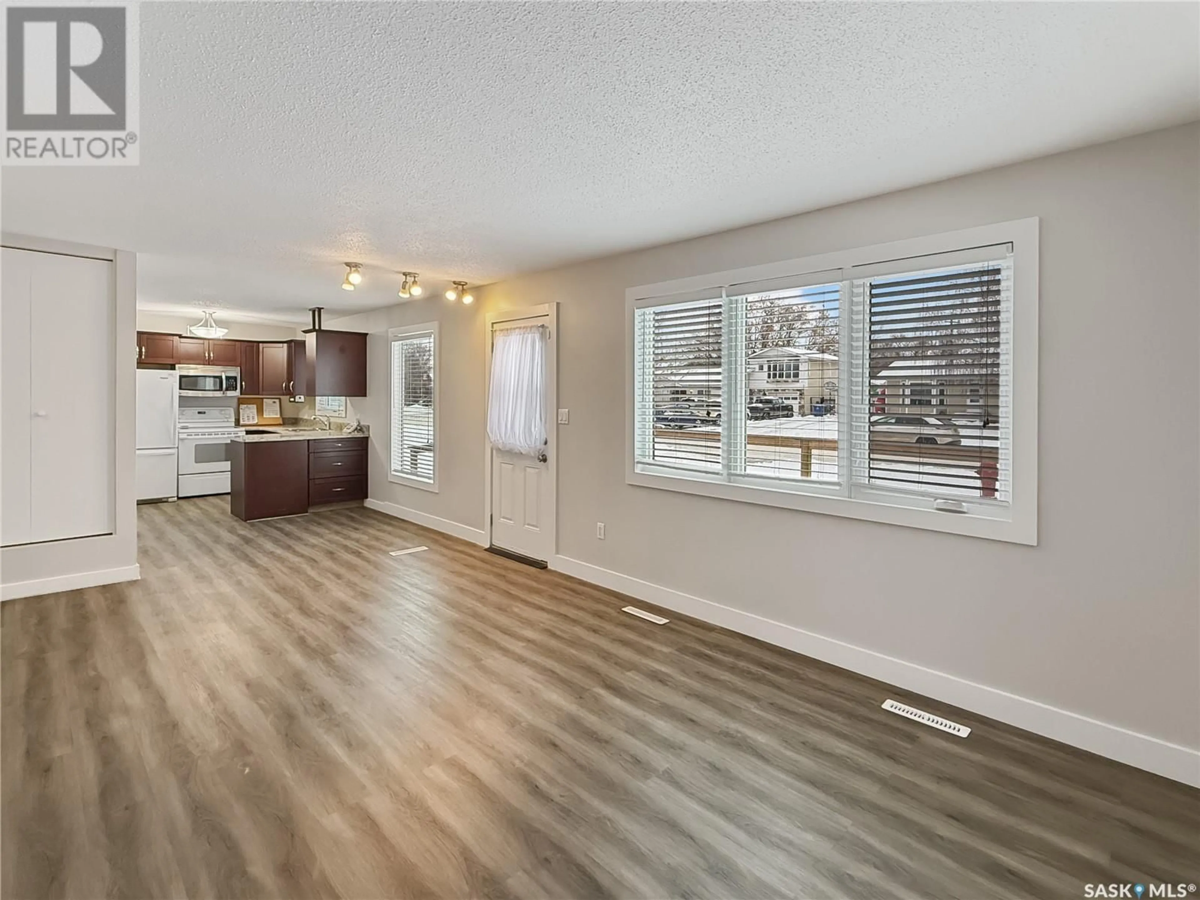 Open concept kitchen, wood/laminate floor for 252 29th STREET, Battleford Saskatchewan S0M0E0