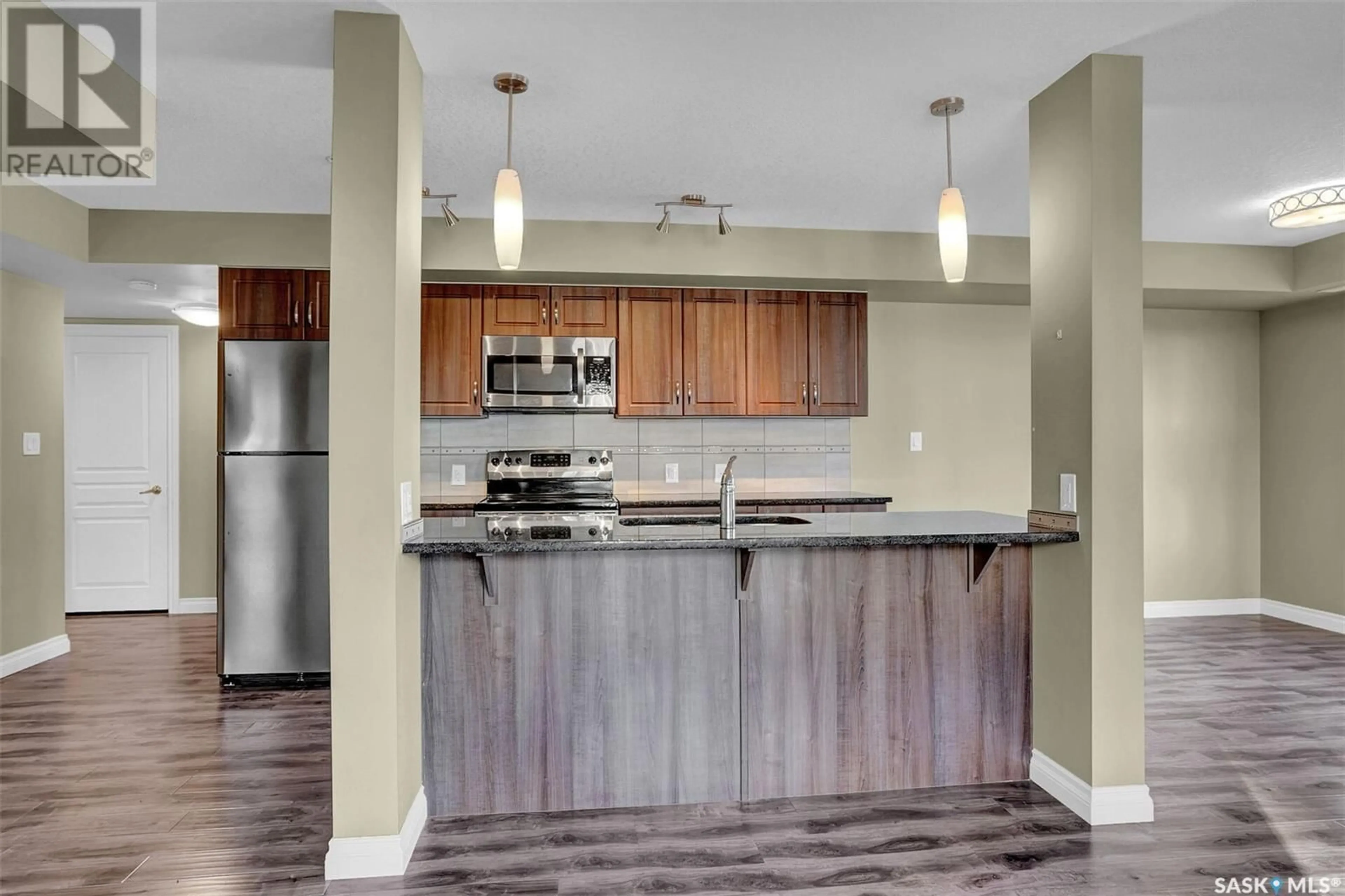 Open concept kitchen, unknown for 205 5303 Universal CRESCENT, Regina Saskatchewan S4W0L1