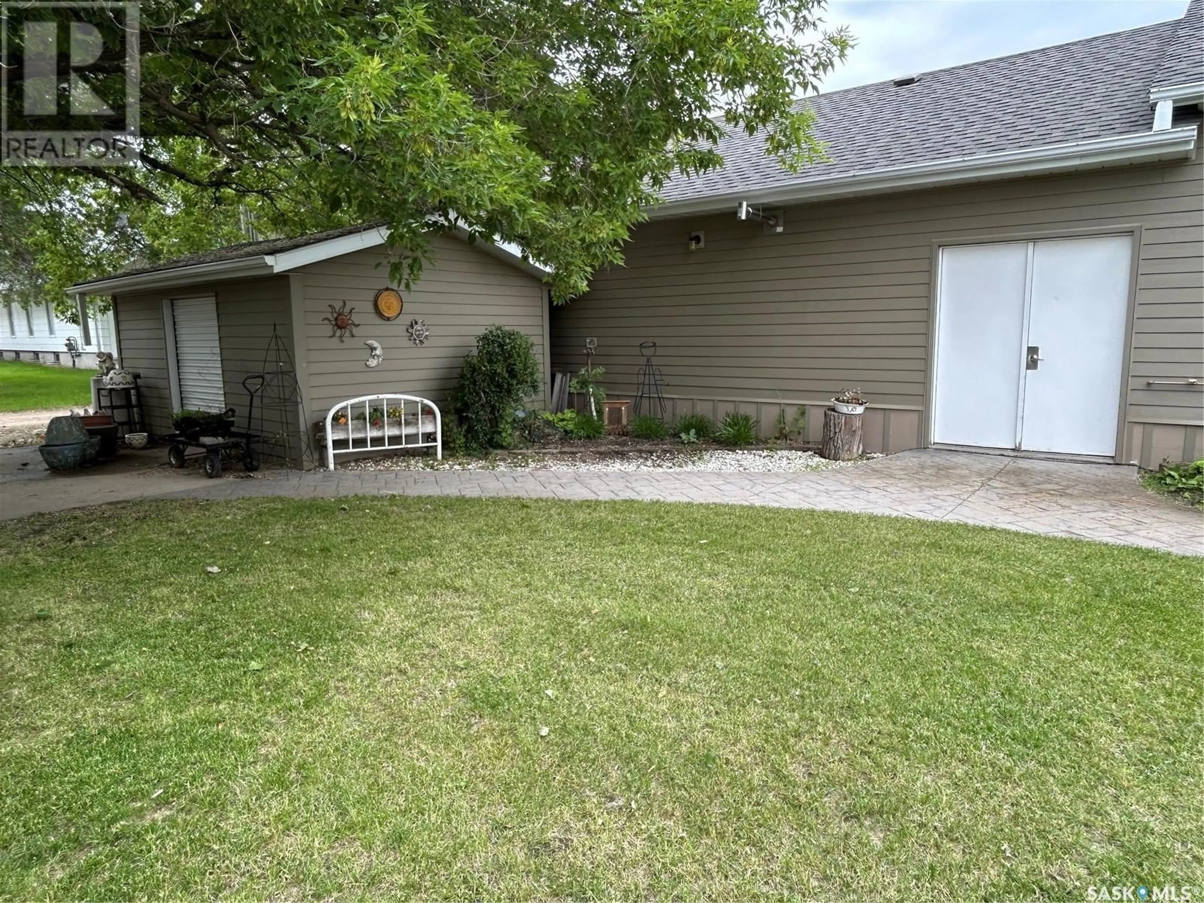 A pic from outside/outdoor area/front of a property/back of a property/a pic from drone, street for 219 7th STREET W, Carlyle Saskatchewan S0C0R0