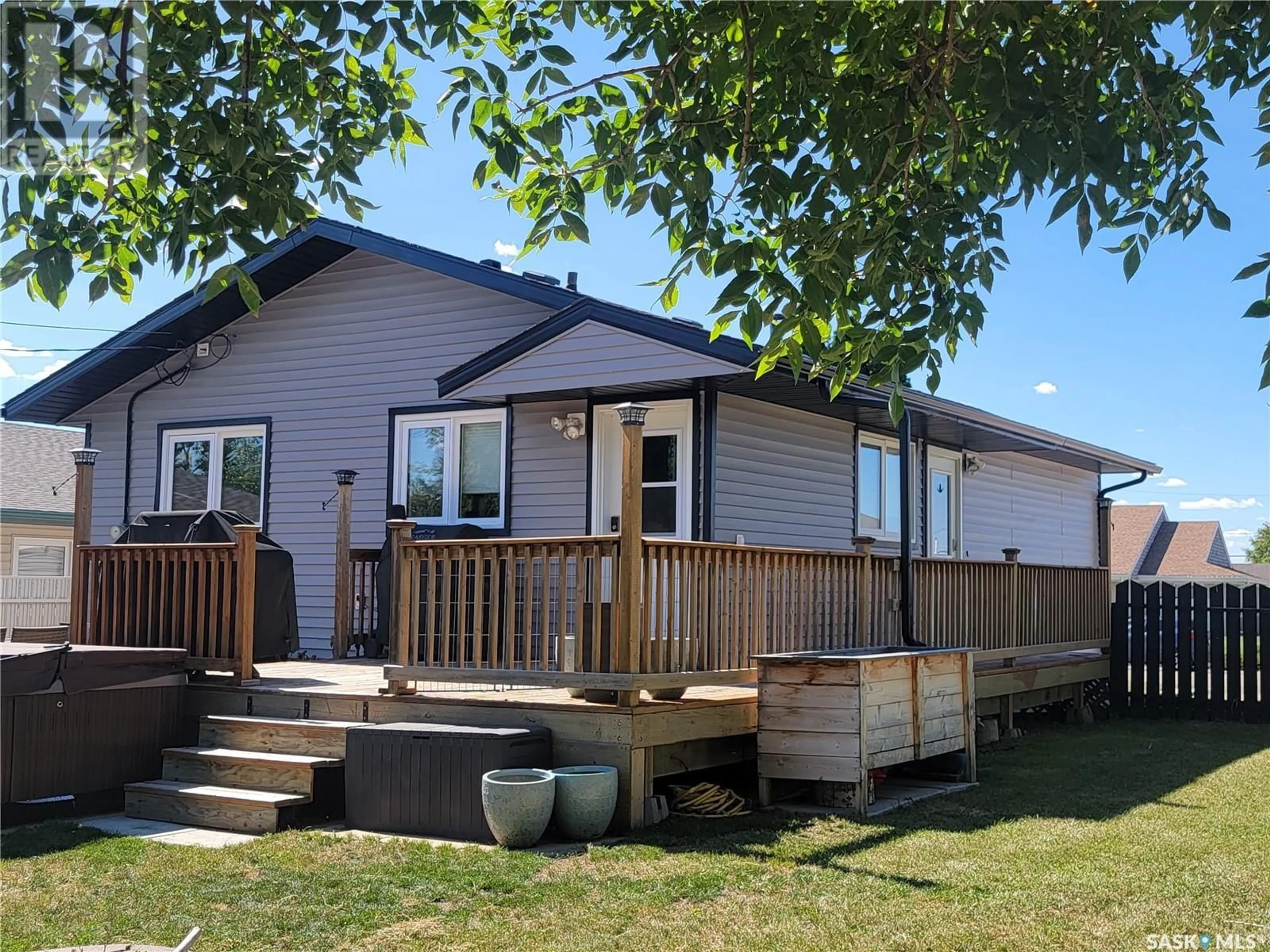 Home with vinyl exterior material, street for 5305 Herald STREET N, Macklin Saskatchewan S0L2C0