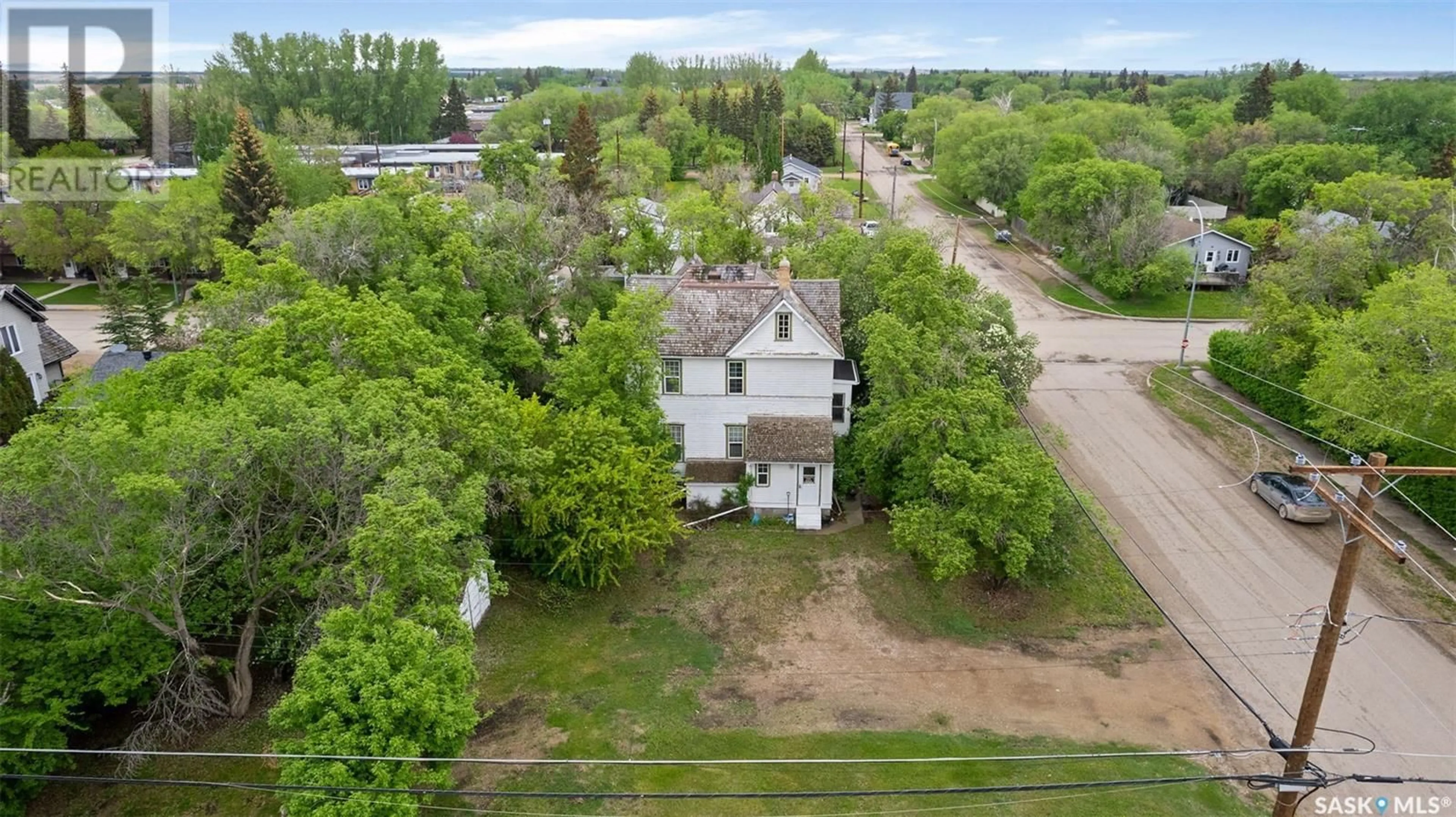 A pic from outside/outdoor area/front of a property/back of a property/a pic from drone, building for 207 4th AVENUE E, Watrous Saskatchewan S0K4T0