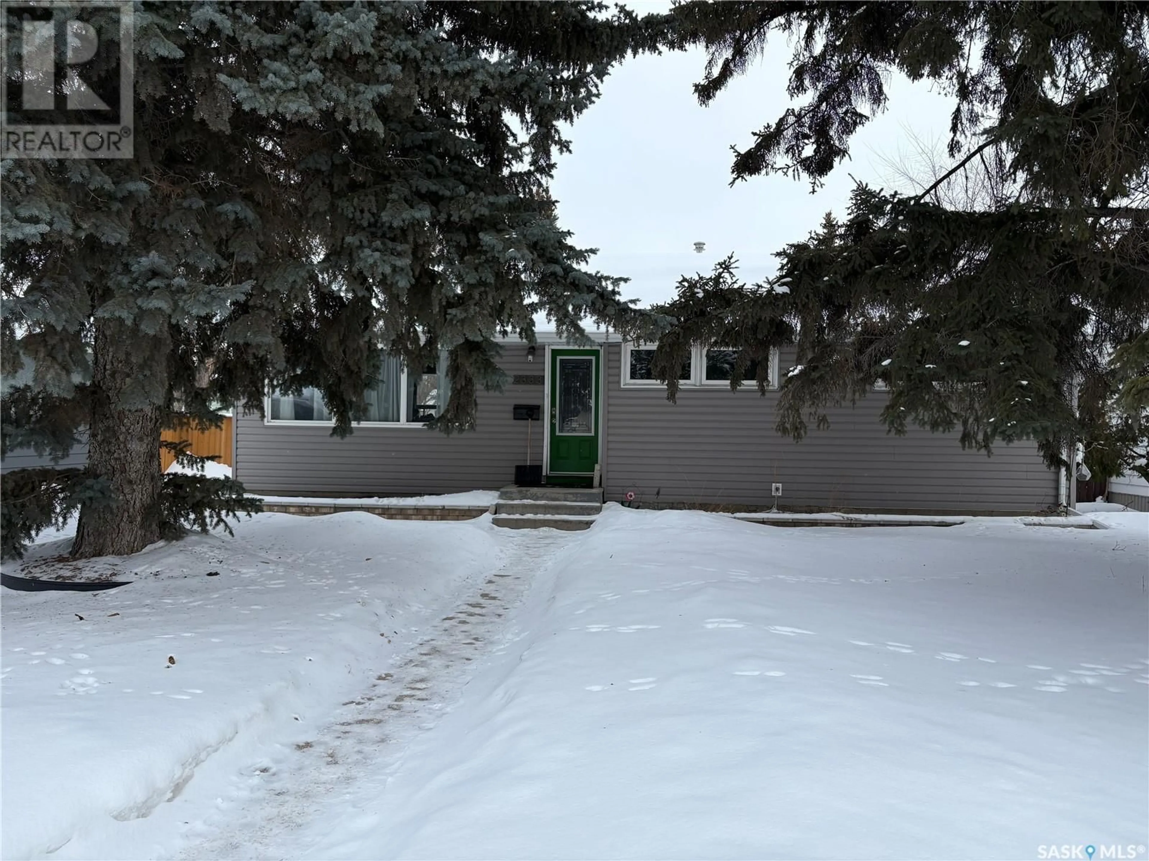 A pic from outside/outdoor area/front of a property/back of a property/a pic from drone, street for 2333 Clarence AVENUE S, Saskatoon Saskatchewan S7L1L8