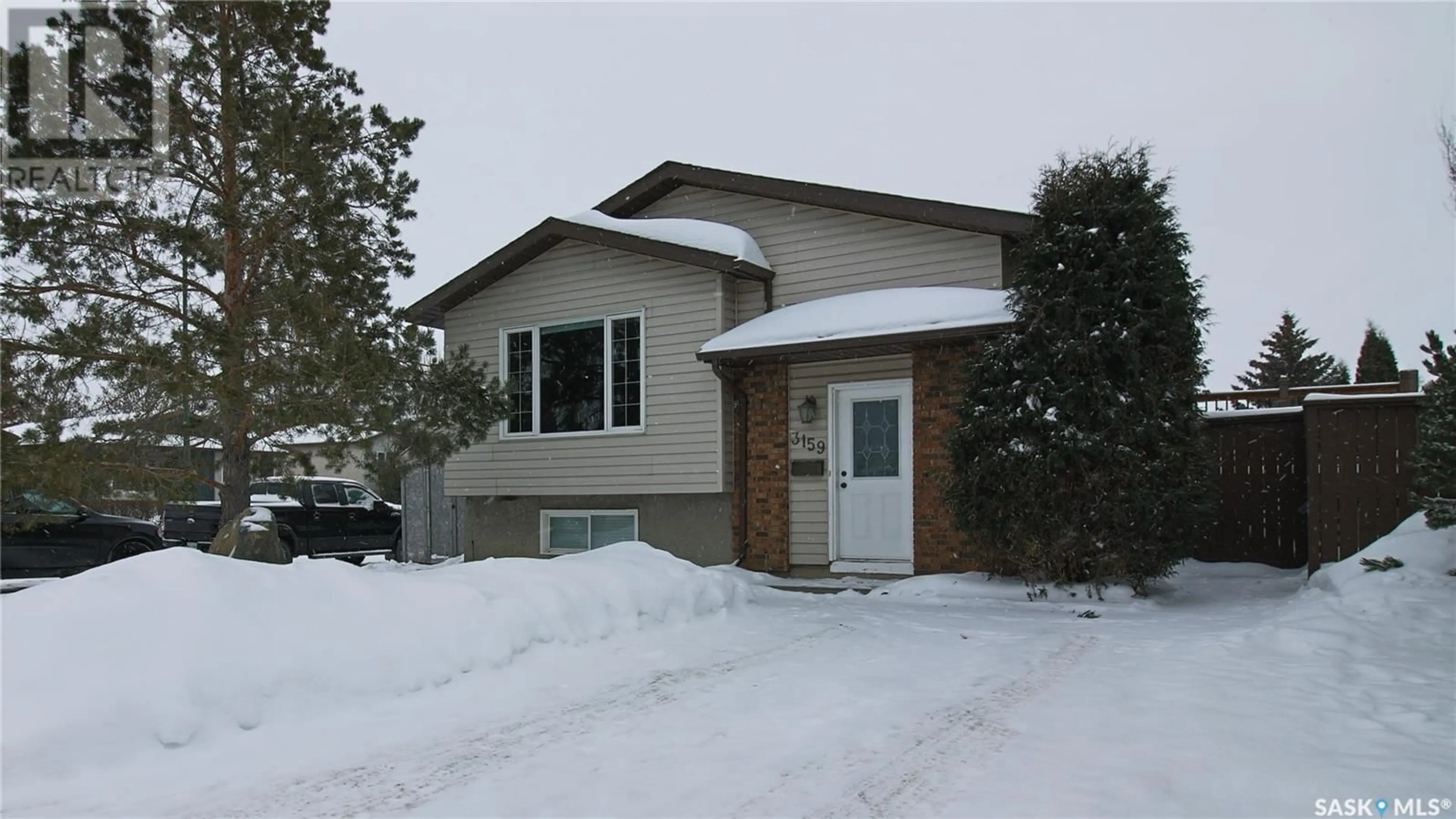 Home with vinyl exterior material, street for 3159 Jenkins DRIVE E, Regina Saskatchewan S4N6X4