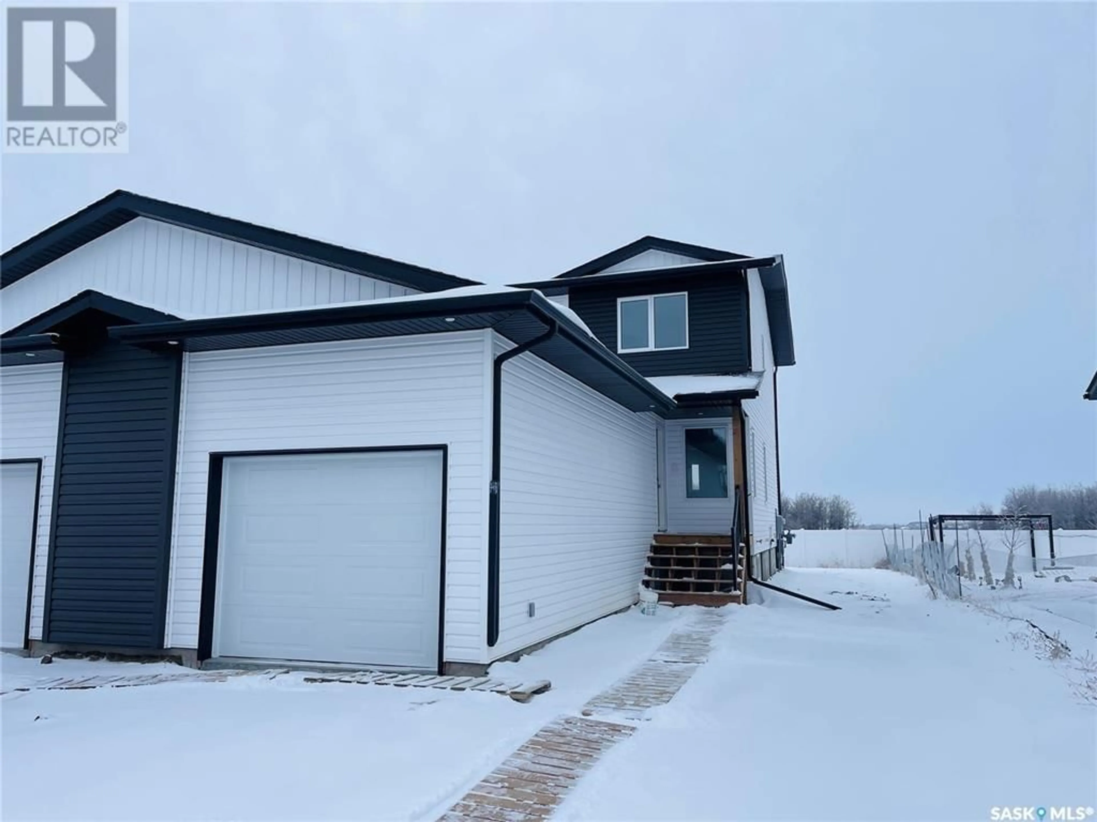 A pic from outside/outdoor area/front of a property/back of a property/a pic from drone, unknown for 234 Froese CRESCENT, Warman Saskatchewan S0K4S0