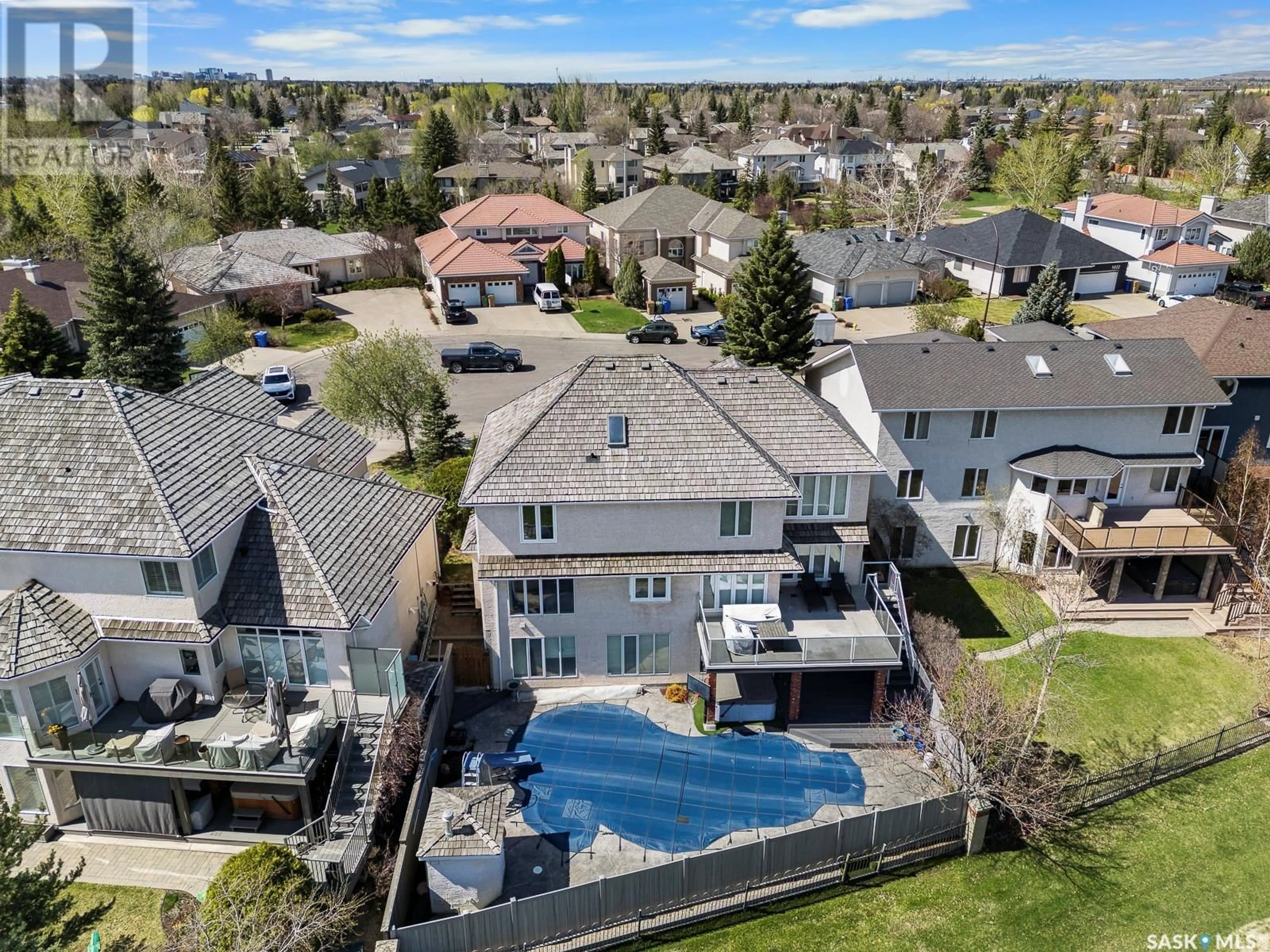 A pic from outside/outdoor area/front of a property/back of a property/a pic from drone, water/lake/river/ocean view for 5054 WASCANA VISTA COURT, Regina Saskatchewan S4V2S2