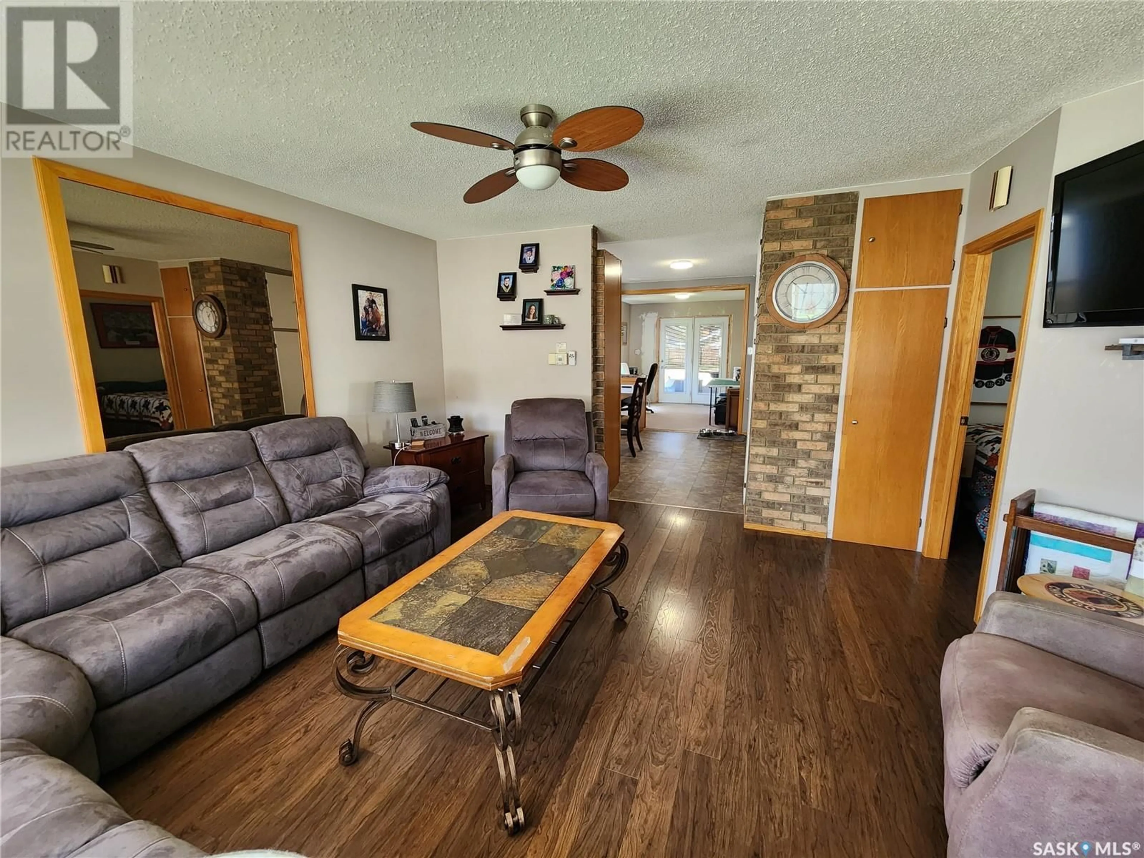 Living room with furniture, unknown for 219 9th STREET NE, Weyburn Saskatchewan S4H1E9