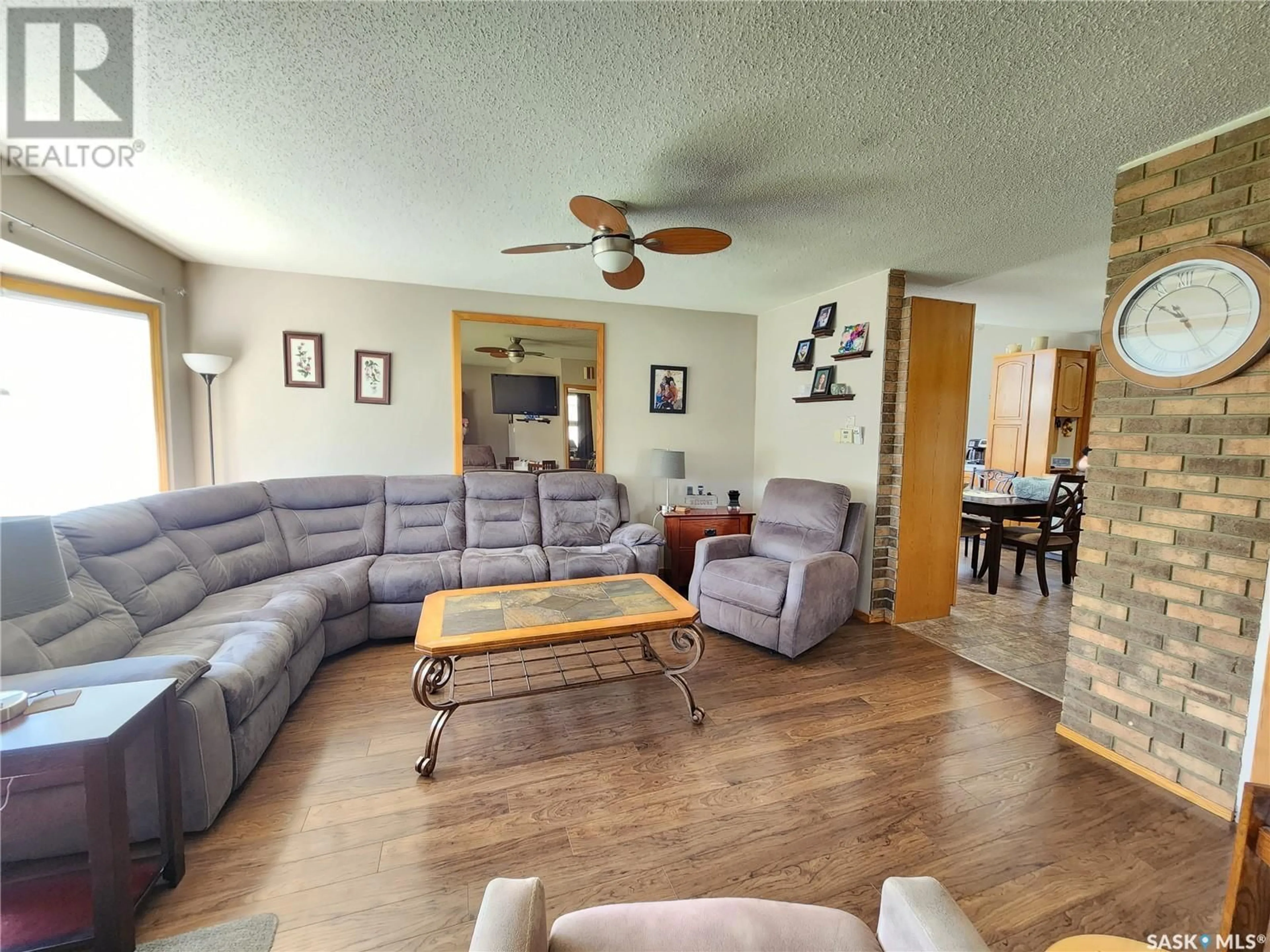 Living room with furniture, unknown for 219 9th STREET NE, Weyburn Saskatchewan S4H1E9