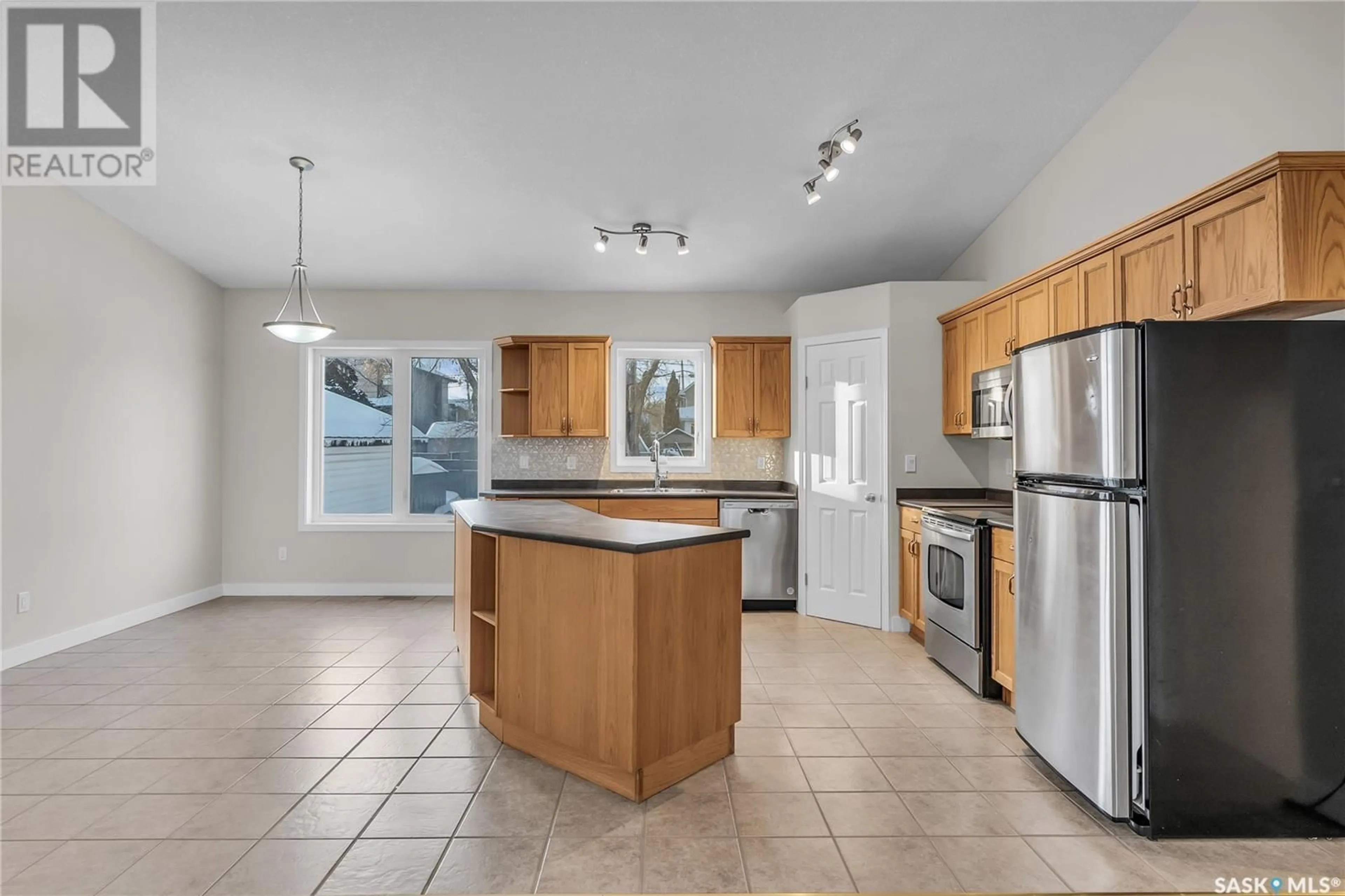 Open concept kitchen, ceramic/tile floor for 1309 6th AVENUE N, Saskatoon Saskatchewan S7K2T7