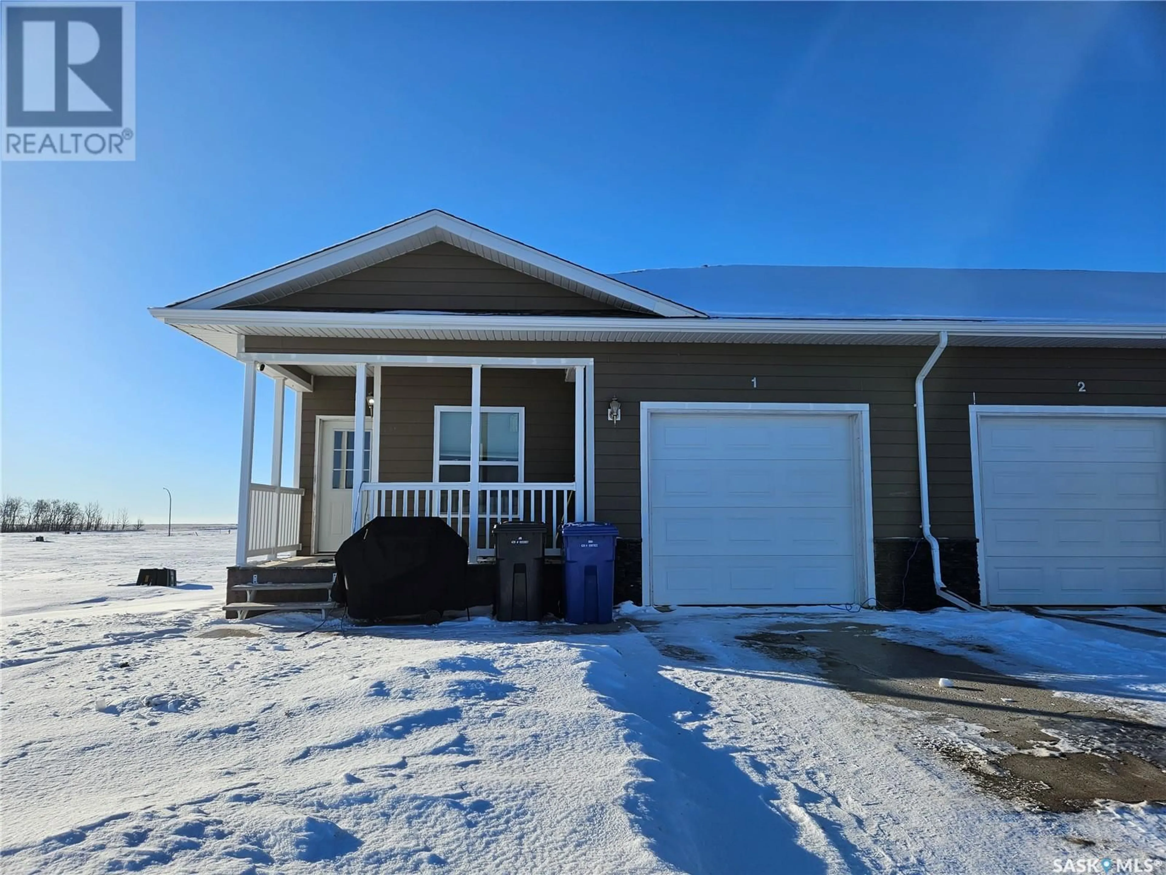 Home with vinyl exterior material, unknown for 1 201 Ruckle ROAD, Carlyle Saskatchewan S0C0R0