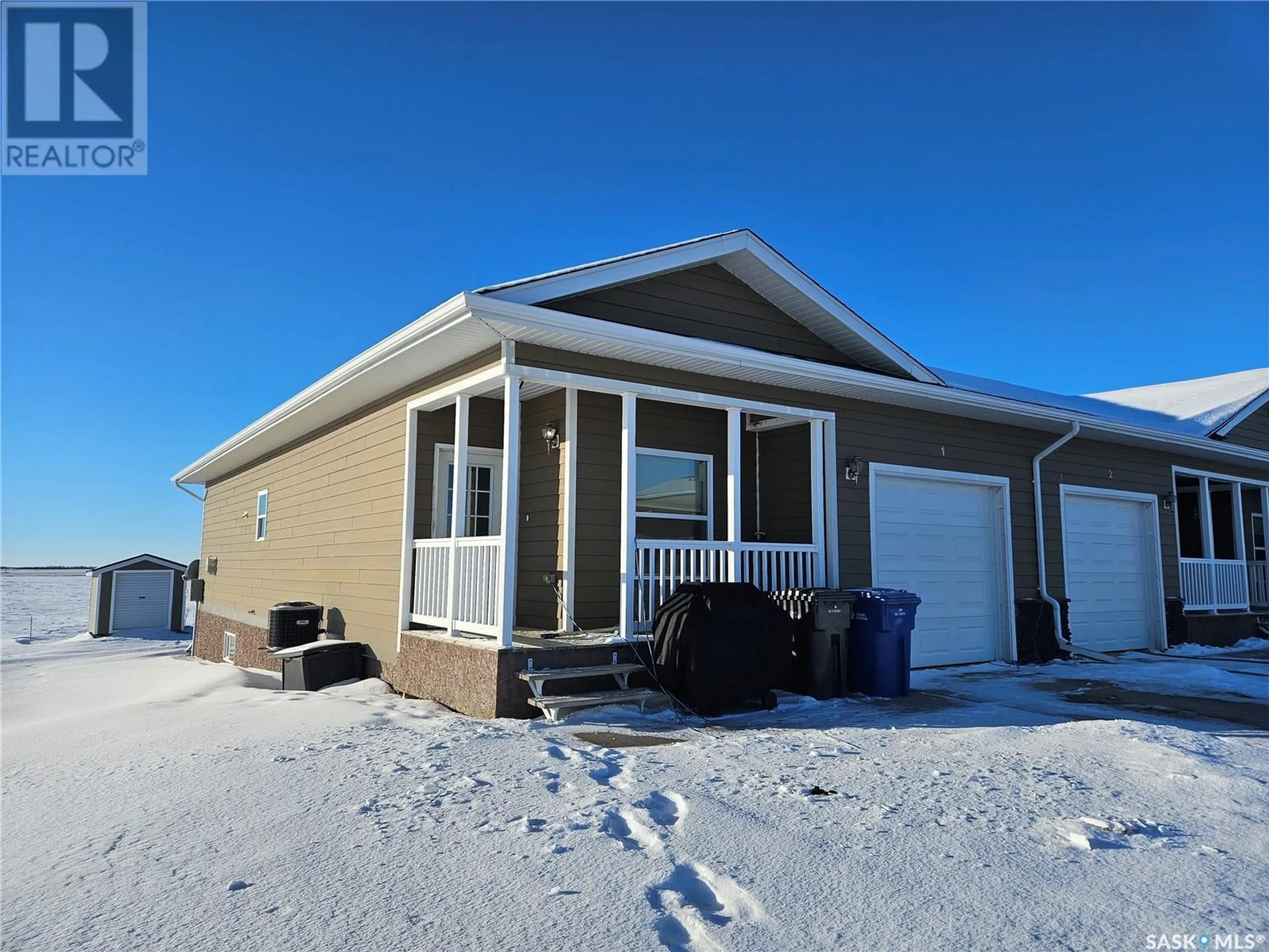 Home with vinyl exterior material, unknown for 1 201 Ruckle ROAD, Carlyle Saskatchewan S0C0R0