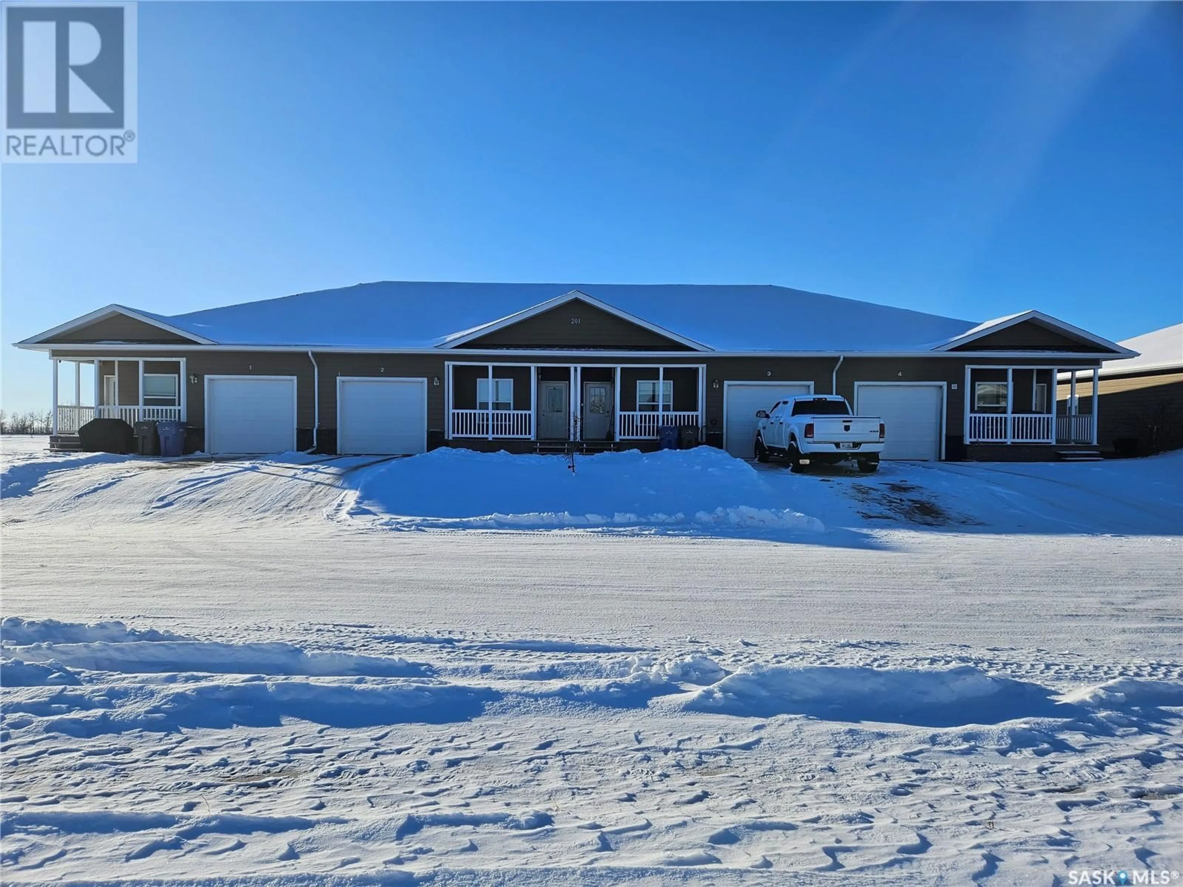 A pic from outside/outdoor area/front of a property/back of a property/a pic from drone, building for 1 201 Ruckle ROAD, Carlyle Saskatchewan S0C0R0