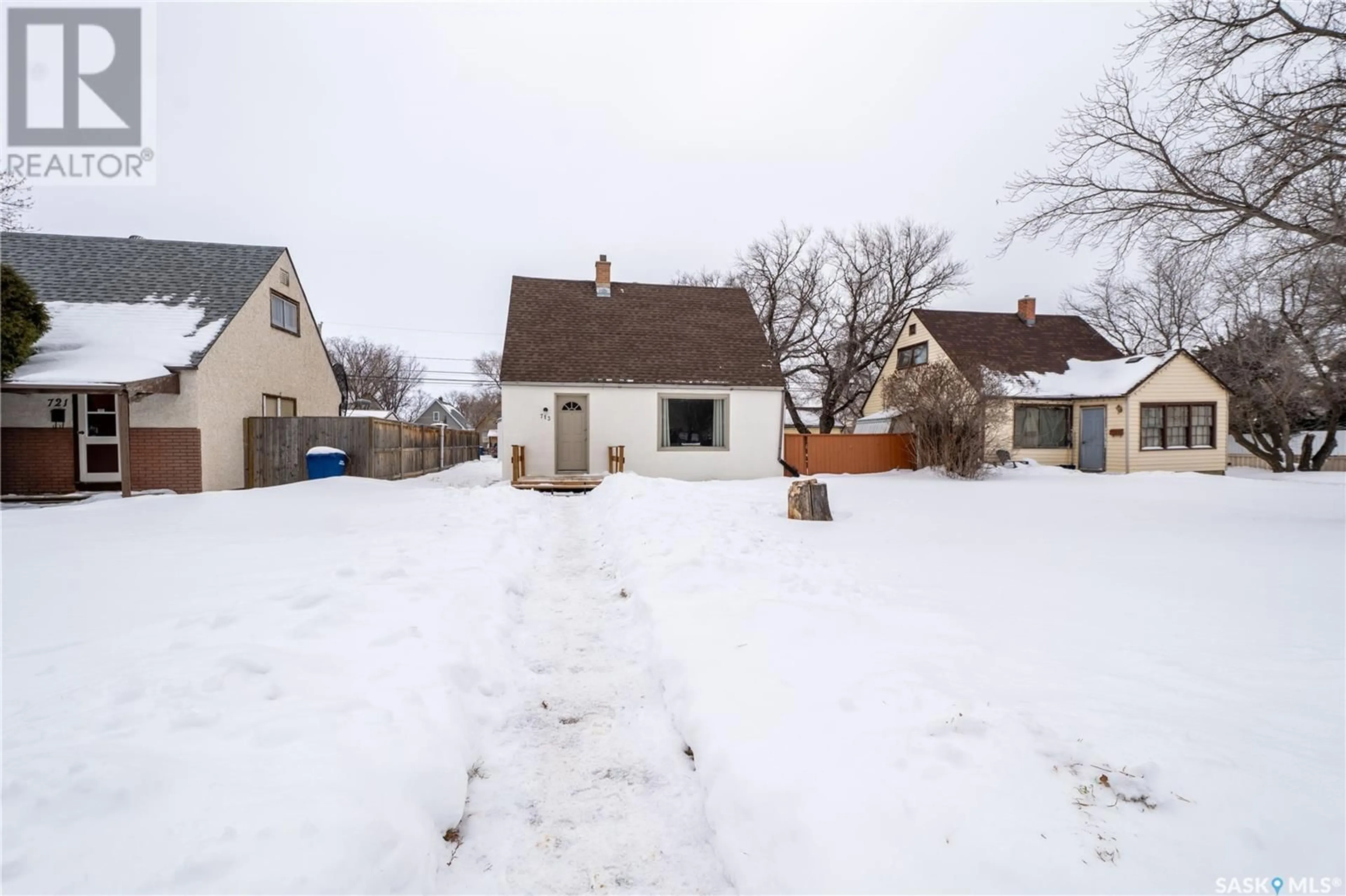 A pic from outside/outdoor area/front of a property/back of a property/a pic from drone, street for 713 STADACONA STREET E, Moose Jaw Saskatchewan S6H0K3